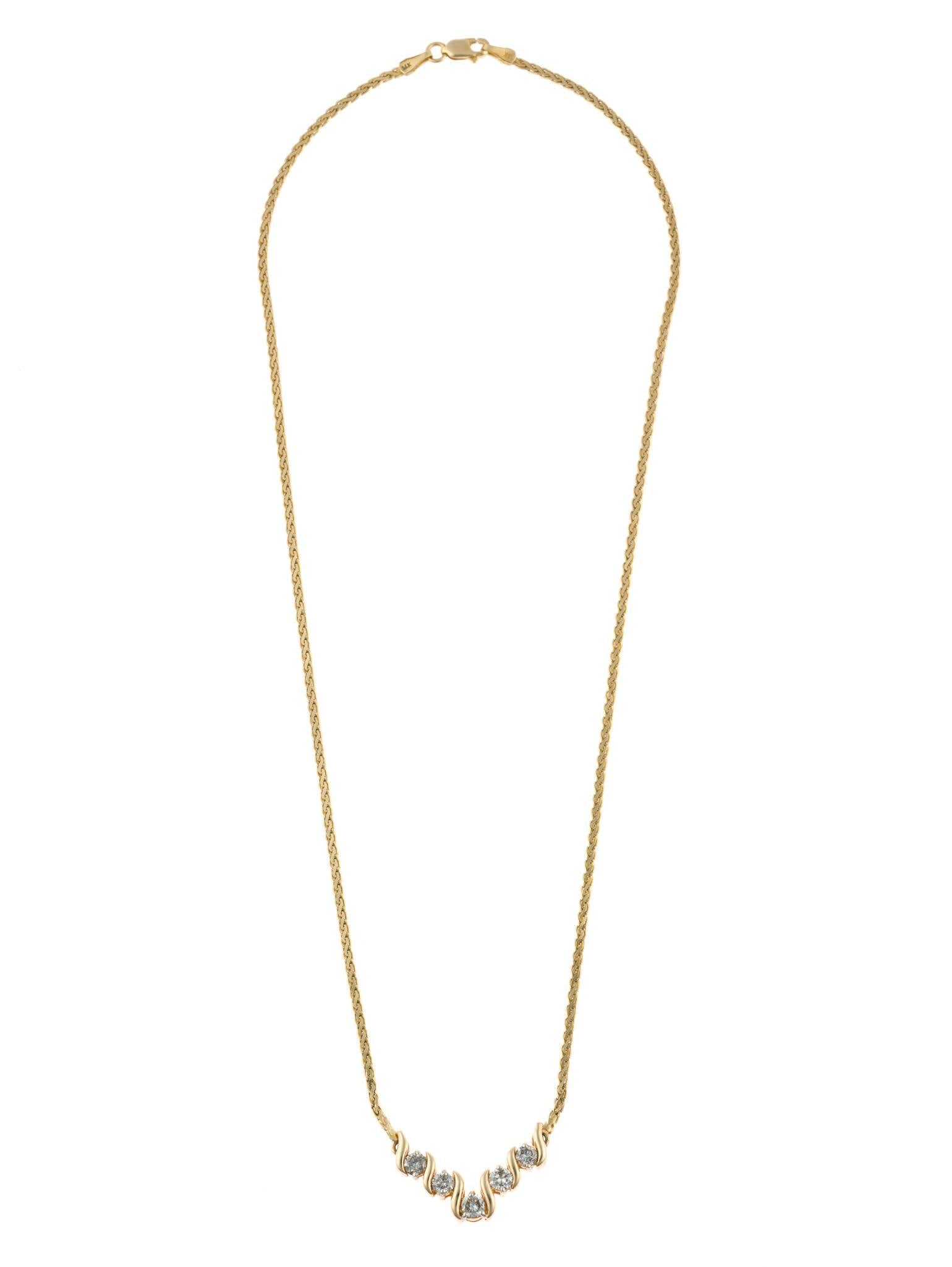 14K Gold and Diamond Necklace: A 17" yellow gold necklace with a five diamond pendant. The total carat weigh of the diamonds is approximately 0.6 carats. The necklace has no signs of wear or damage. It weighs 6.7 grams. It is 