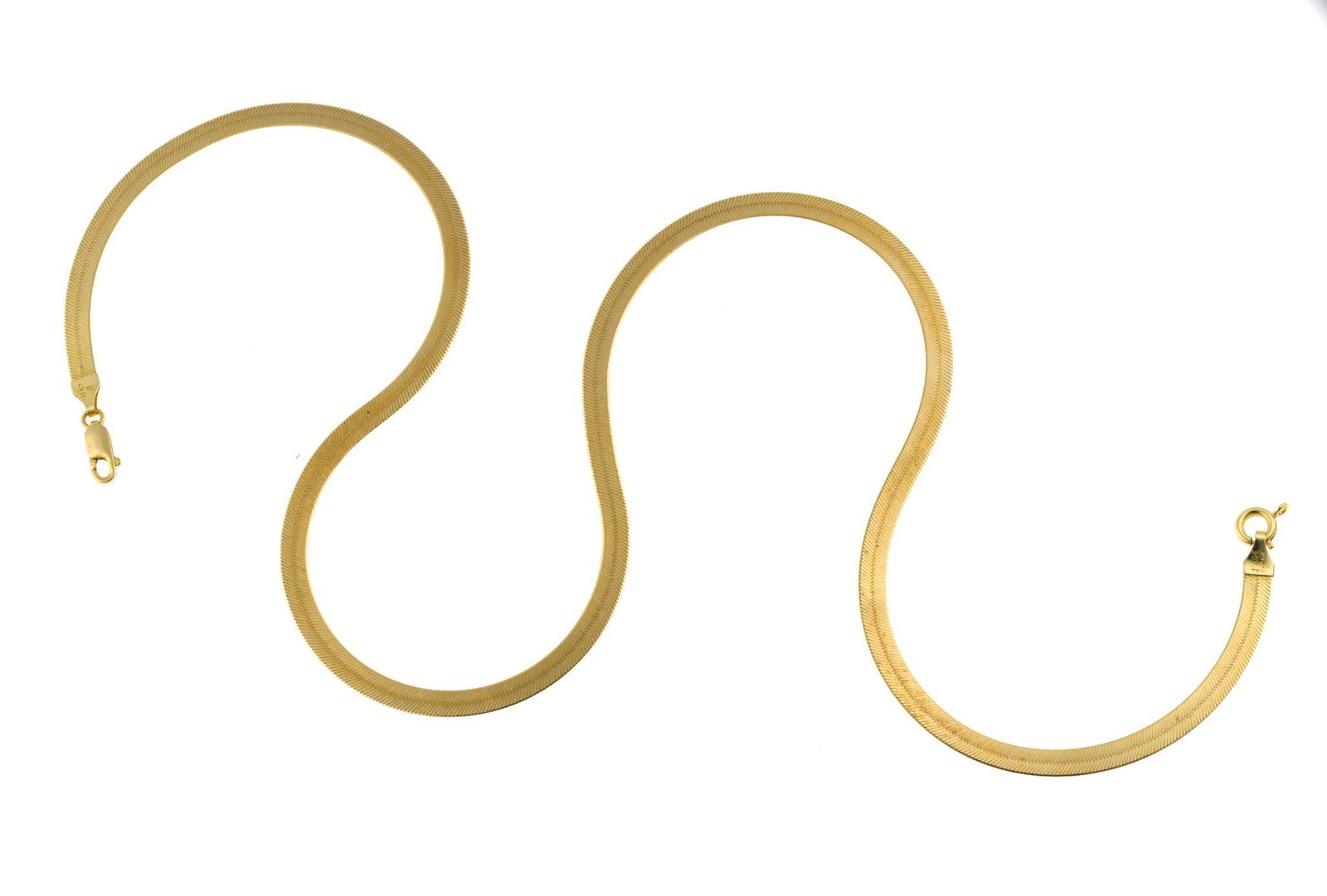 14K Gold Chain Necklace: A 22" yellow gold herringbone chain necklace. It is marked 14k and weighs 10.3 grams It has no damage.