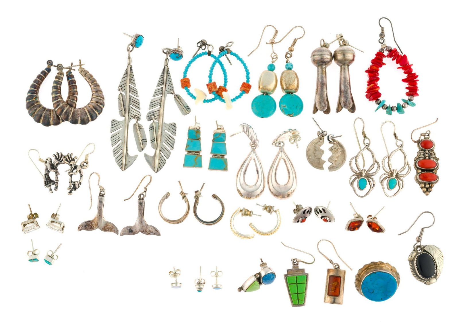 Sterling Silver Earrings: Includes kokopelli, turquoise, coral, modernist, split buffalo nickels, spiders, mermaid tails, and more. Most pieces are marked. Some are singles. The total weight is 3.6 troy ounces. 