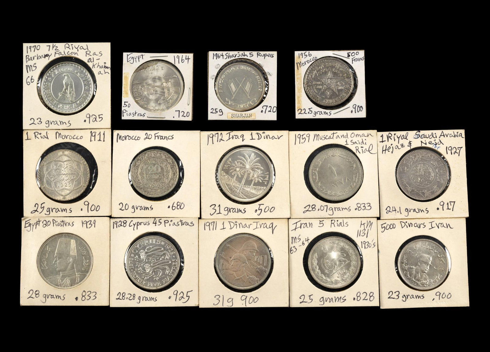 Fourteen Silver Middle Eastern Dollar Sized Coins: 1927 Riyal Saudi Arabia, 1970 7 1/2 Riyals Ras Al-Khaimah and Ajman Barbary Falcon, 1959 Muscat and Oman 1 Saidi Rial, two Iraq Dinars, Iran 1930's 5 Rials, Iran 5000 Dinars, three Morocco coins inclu