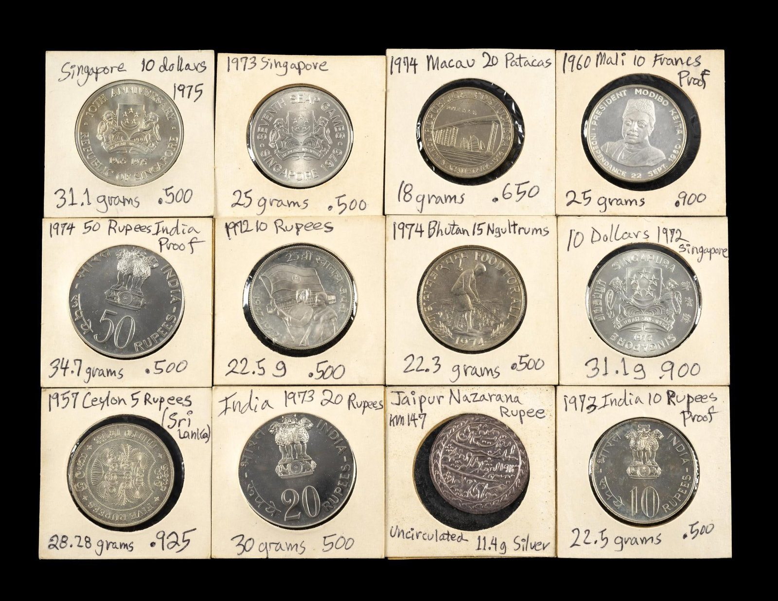 Uncirculated And Proof Silver Asian Coins: Twelve coins include India, Ceylon, Mali, Macau Bhutan, and Singapore. Dates are from approximately 1900 to the 1970's.
