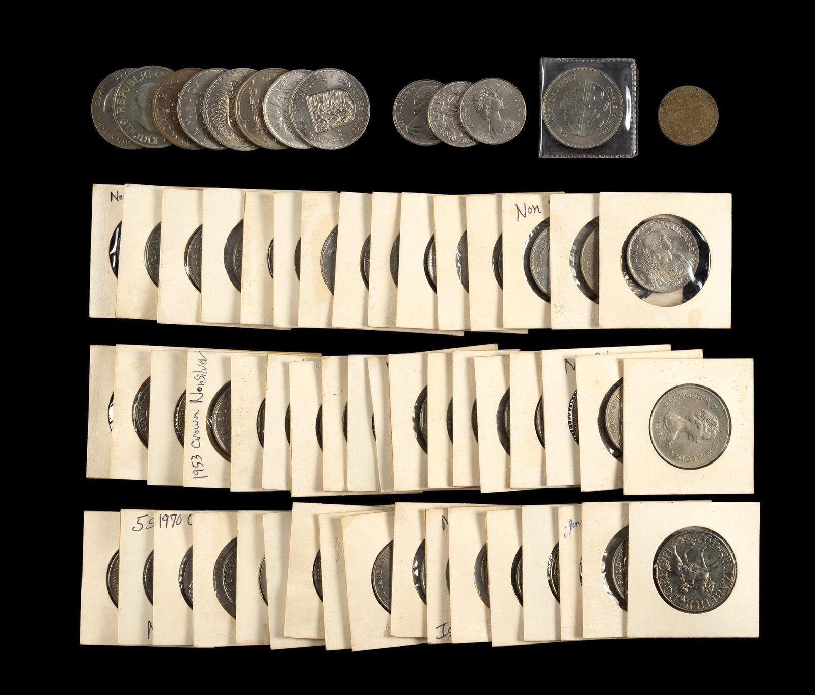 World Dollar Sized Coins: Approximately 60 coins with most being copper nickel and none noted to be silver.