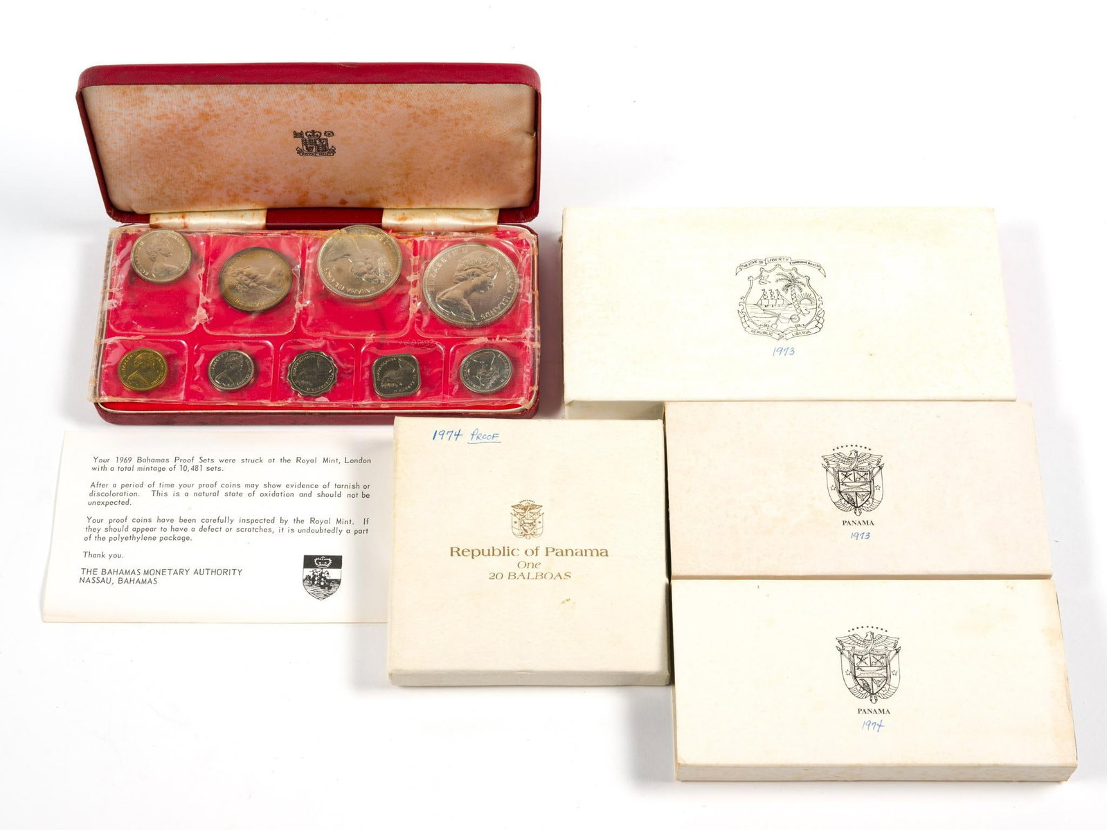Silver World Proof Sets: 1973 Liberia with silver of 34.1 grams .900 fine. 1974 Panama 20 Balboas 129.6 grams .925 sterling. 1969 Bahamas 9 coin set with ASW 2.87 troy ounces pure silver. 1973 and 1974 Panama with one silver 