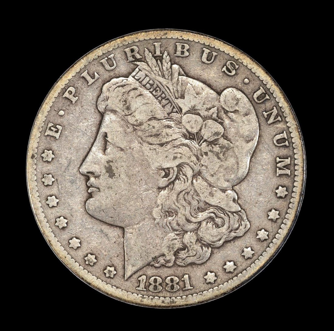 1881-CC Carson City Silver Dollar: 1881-CC with no damage or obvious past cleaning hairlines. Approximately F12-15.