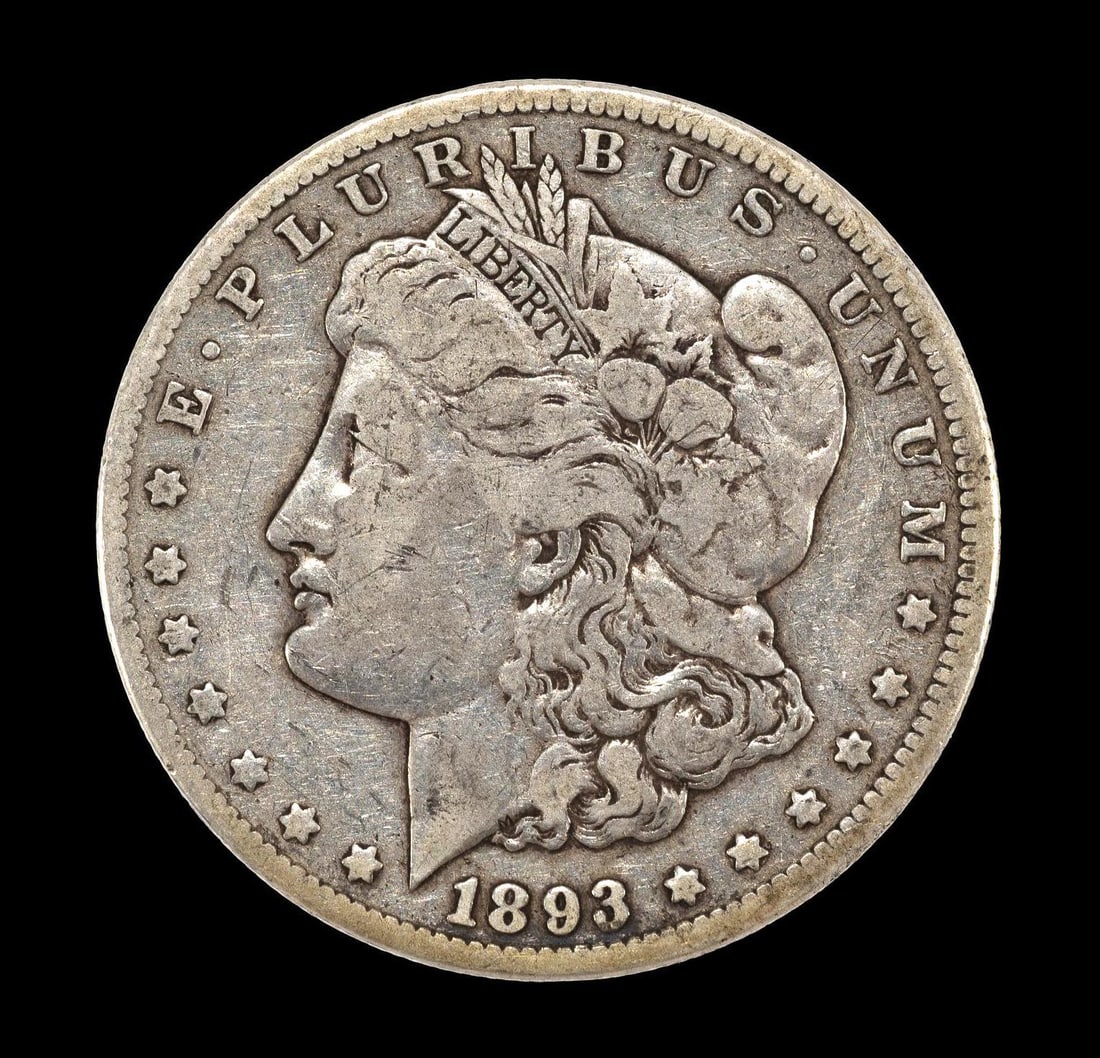 1893-CC Carson City Mint Silver Dollar: 1893-CC with no damage or obvious past cleaning hairlines. Approximately VF20. Slightly lacking in detail for VF20 but without detracting marks and scratches.