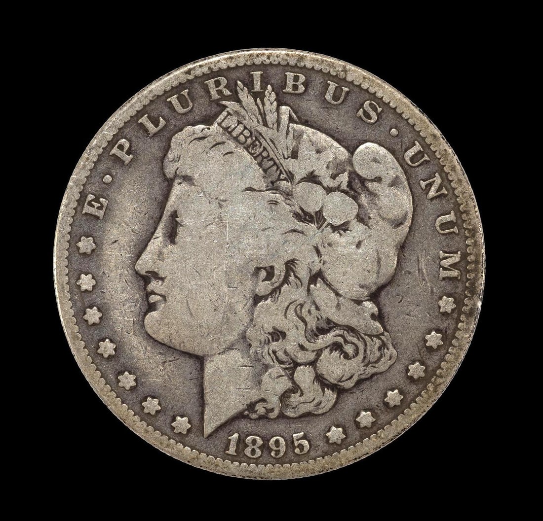 1895-O New Orleans Mint Silver Morgan Dollar: 1895-O with no damage or obvious past cleaning hairlines. G8 to VG10. No distracting circulation marks.