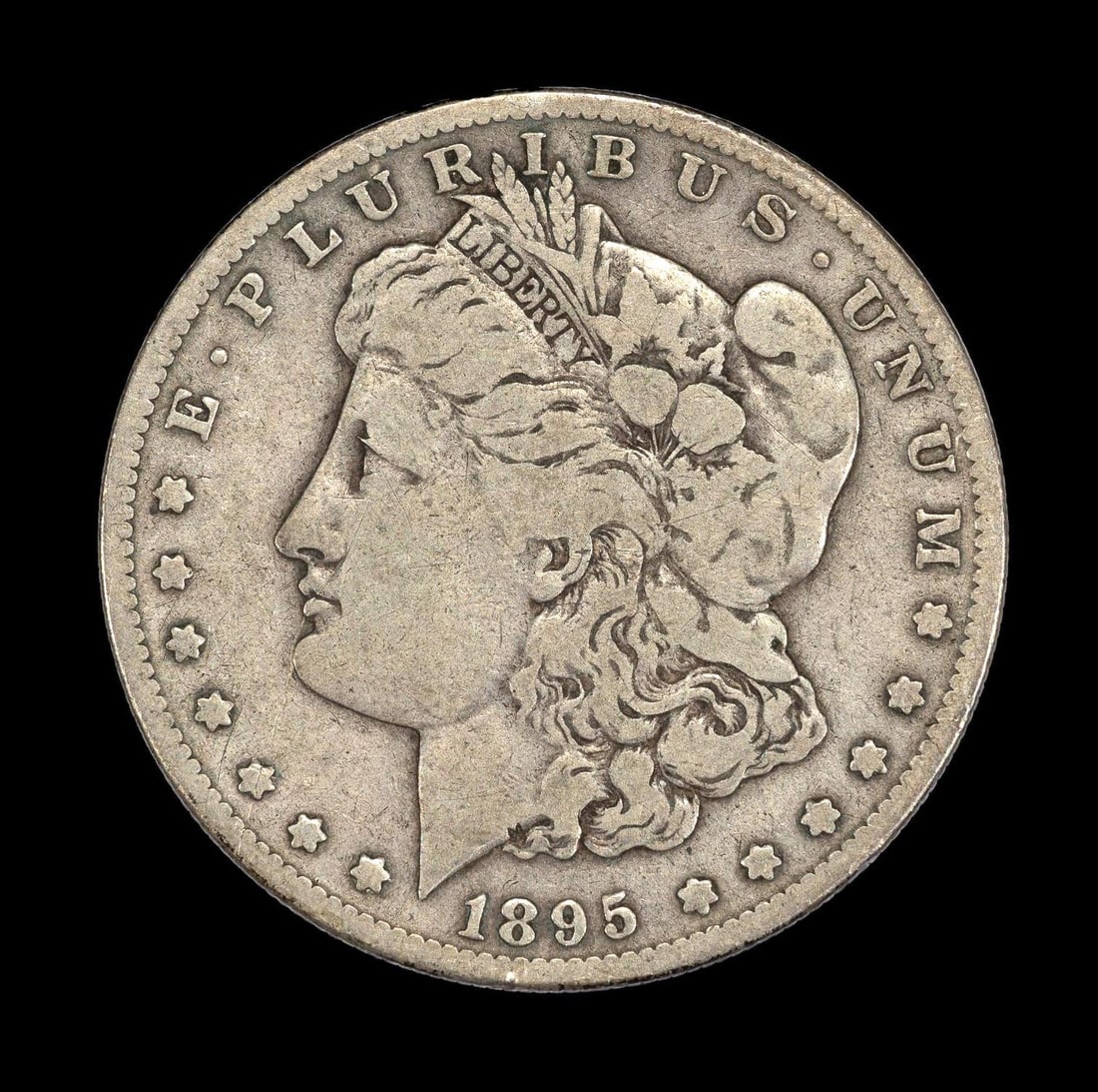 1895-S San Francisco Mint Silver Morgan Dollar: 1895-S with no damage or obvious past cleaning hairlines. Approximately F15-20.