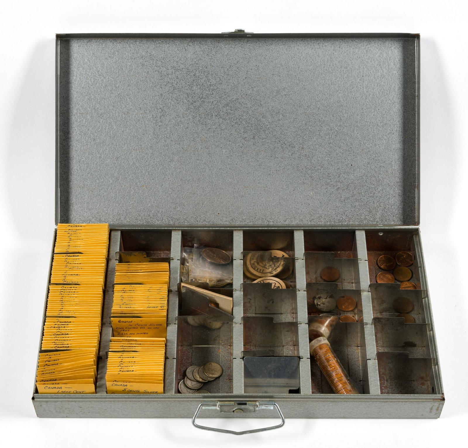 Metal Box Of Canadian Coins Including Silver: The box contains approximately 70 Canada cents, large and small. Five silver half dimes, two silver halves, eleven silver quarters including a VF 1872 H quarter with good original surfaces.