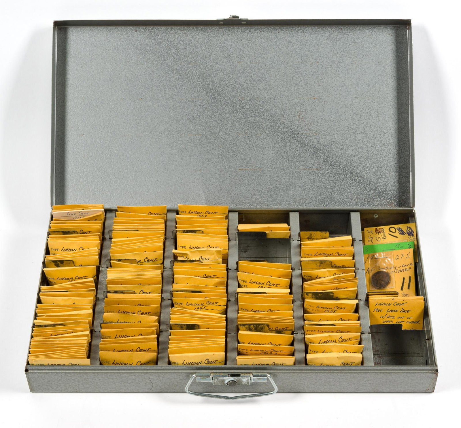 Metal Box Of Over Six Hundred Wheat Cents: The box contains Wheat and Lincoln Memorial Cents, mostly Wheat Cents. They are arranged by date from 1909 through1962. There are some better dates such as 1910-S, 1912-S, 1915-D, 1915-S, 1916-D, 1917