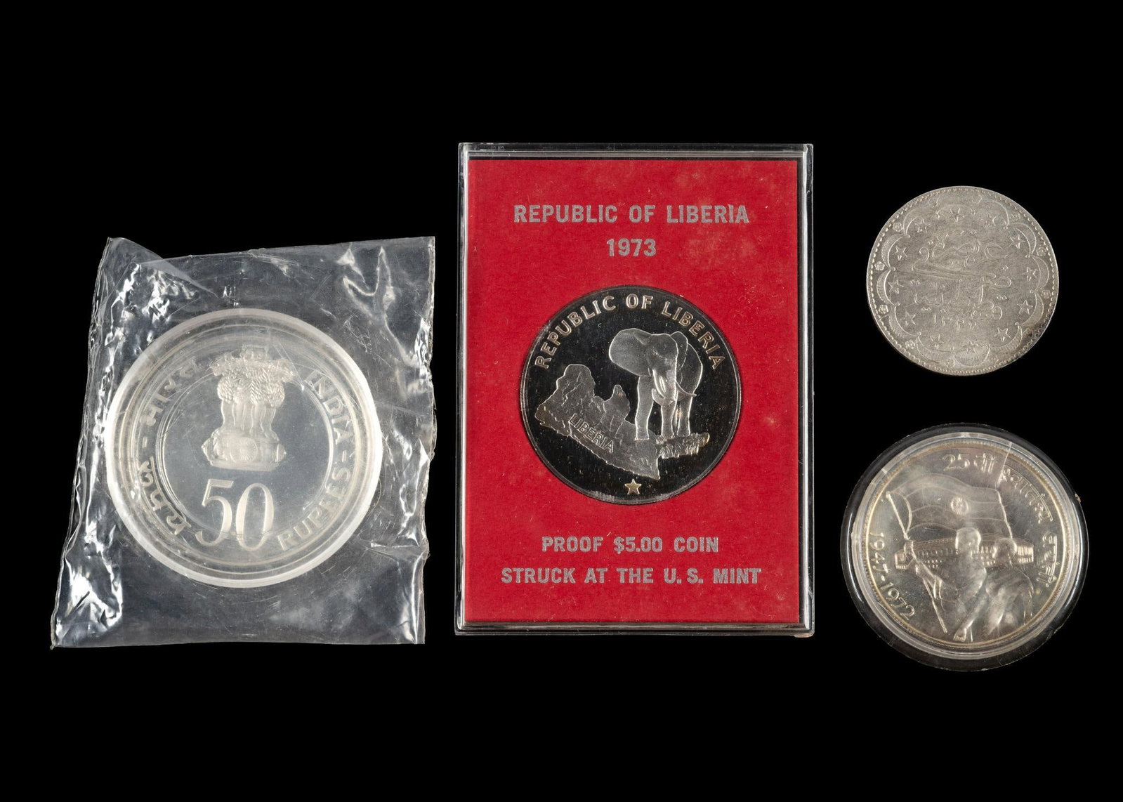 Four Silver World Coins (1 of 2)