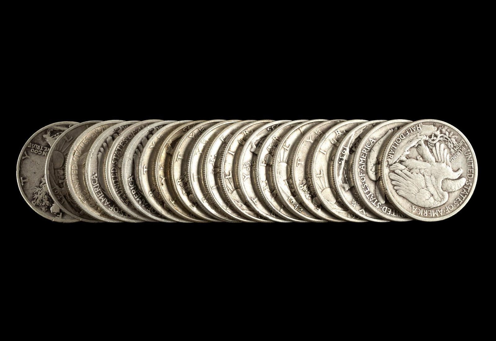 Twenty Walking Liberty Silver Half Dollars: The dates are 1930's and 1940's including an upper XF 1937-S..