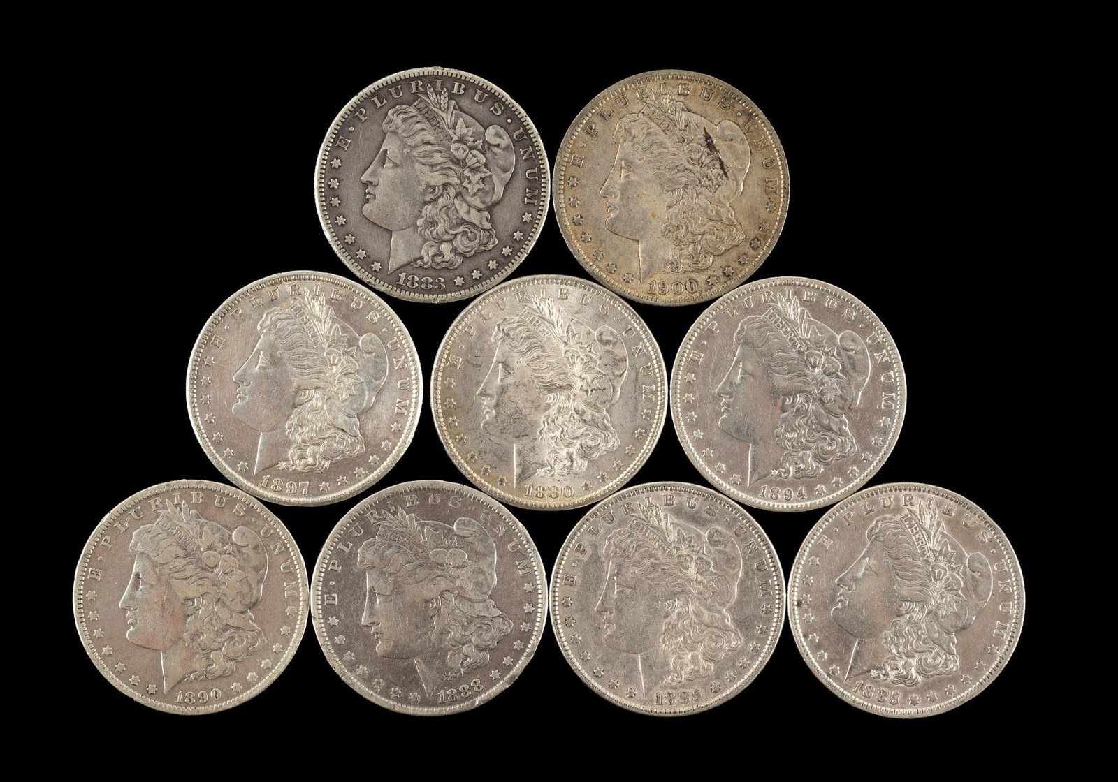 Nine Morgan Silver Dollars (1 of 2)