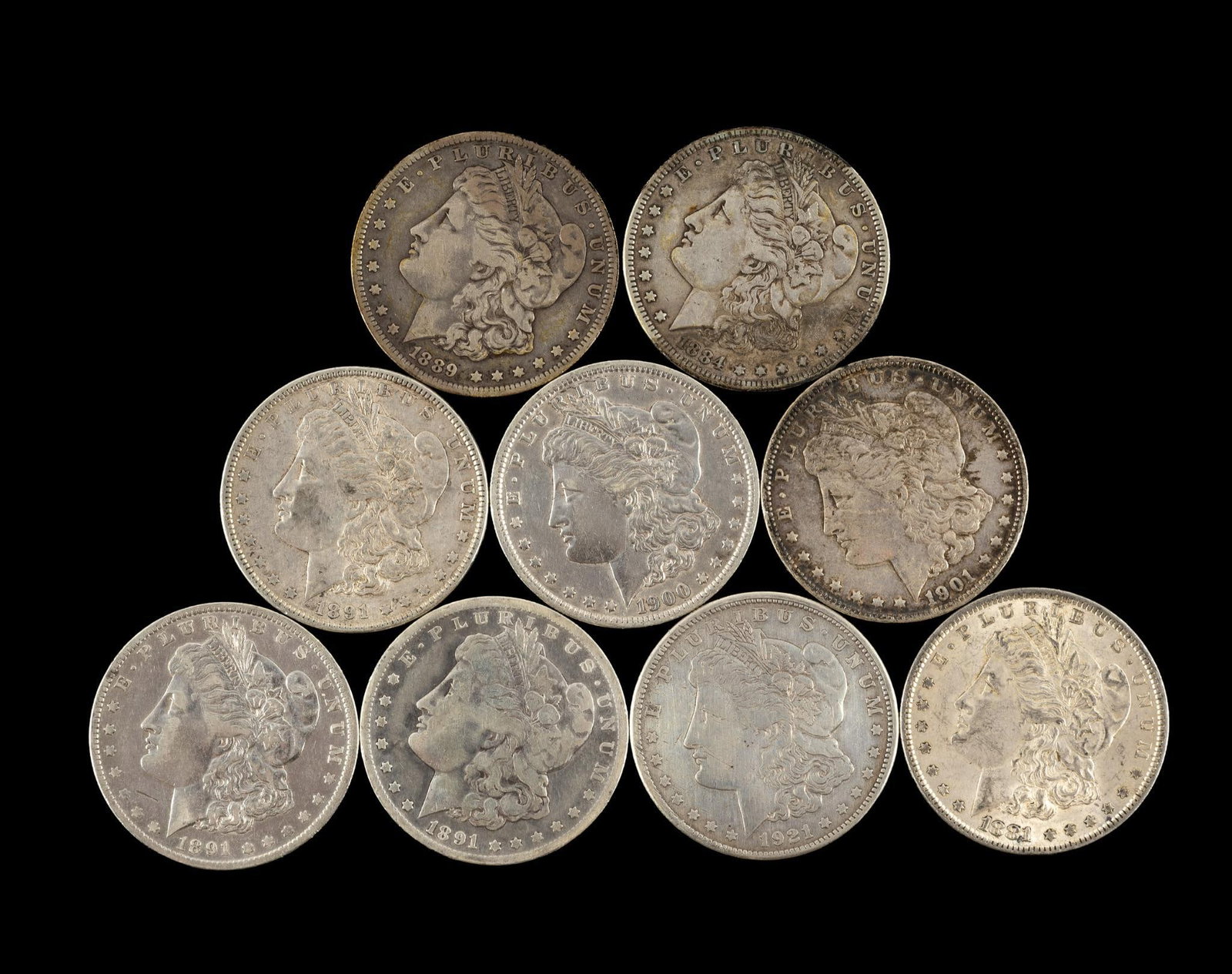 Nine Morgan Silver Dollars (1 of 2)