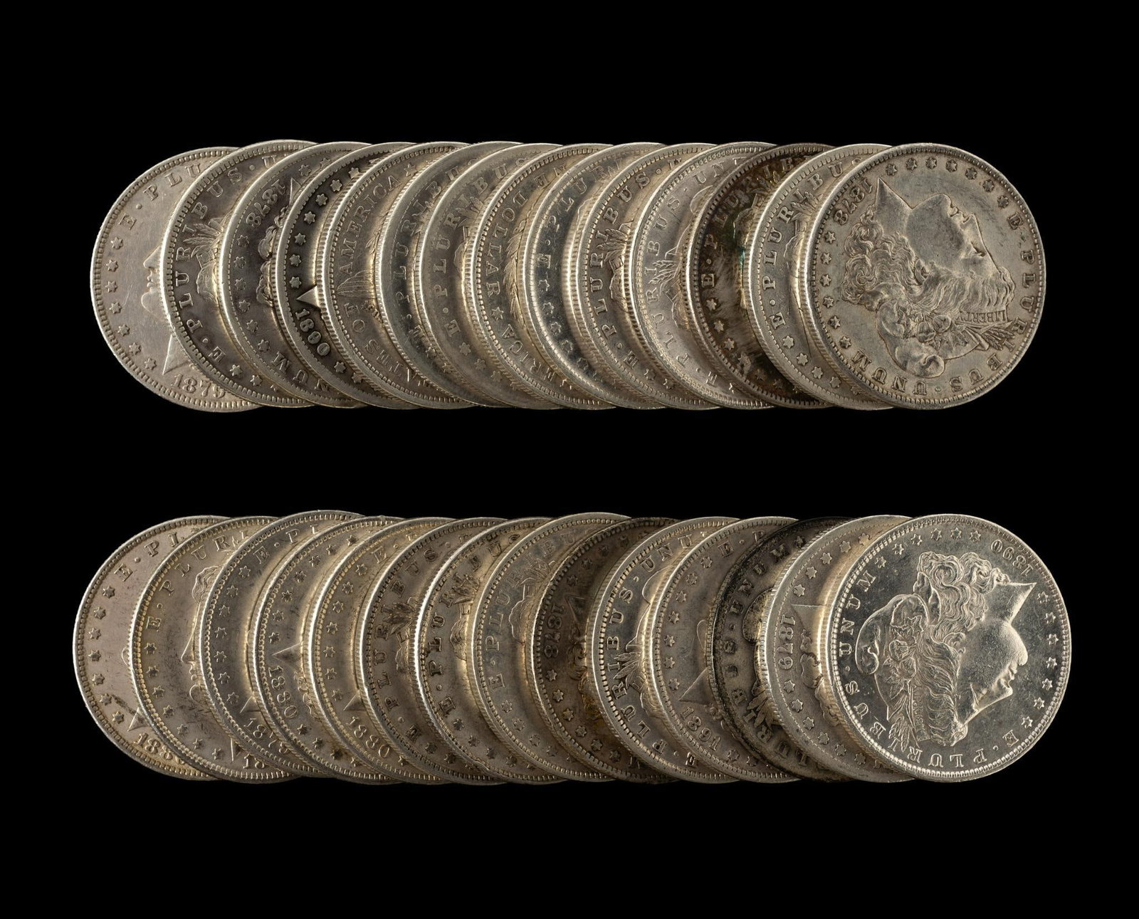 Twenty Eight Morgan Silver Dollars (1 of 1)