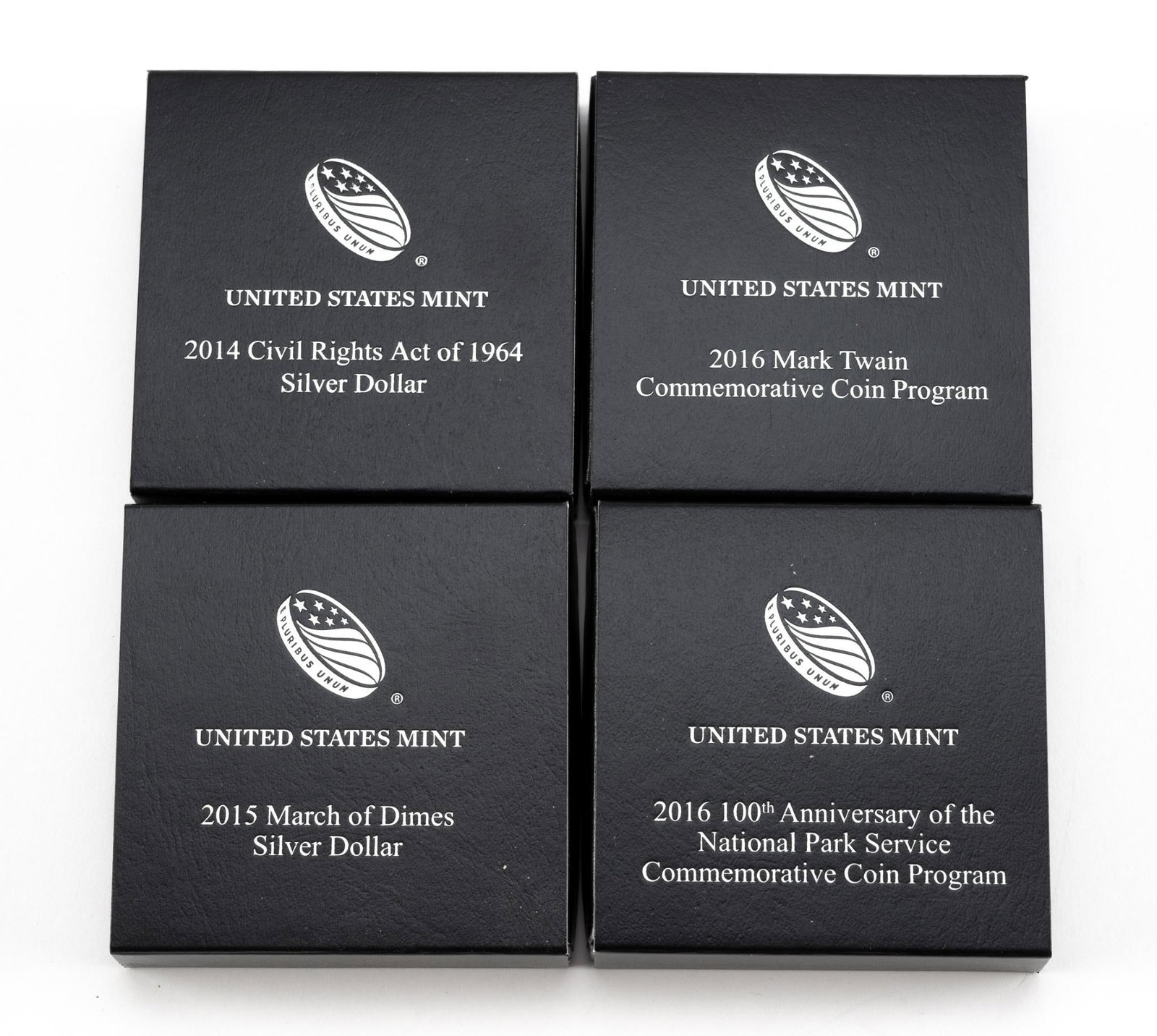 Four Commemorative Silver Dollars: United States Mint Silver Dollars.
