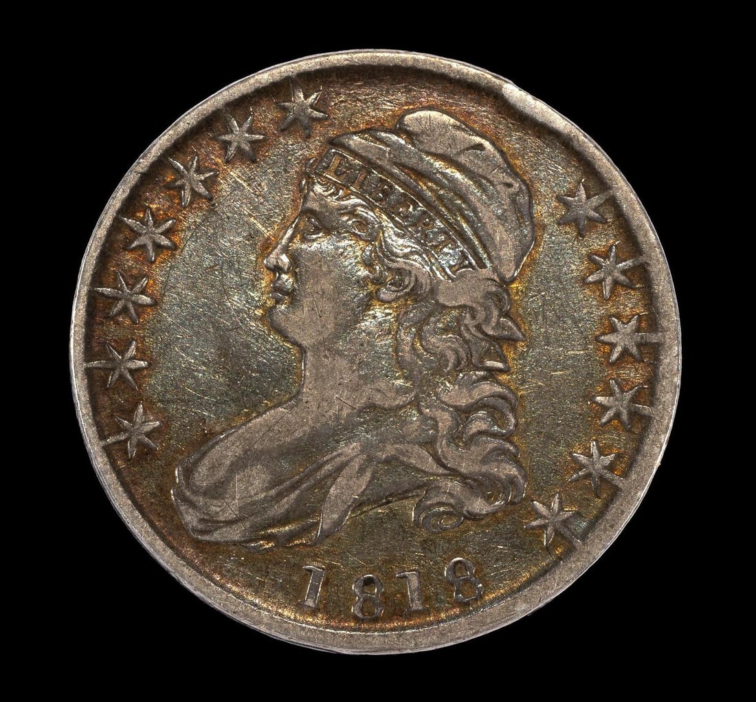 1818 Capped Bust Half Dollar Very Fine: Excellent surfaces with no past cleaning hairlines and with rainbow toning to both sides.. 