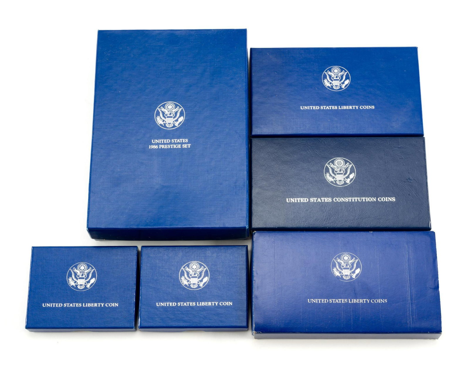 Prestige And Liberty Silver Commemorative Sets: The sets contain five United States Commemorative silver dollars and other coins..