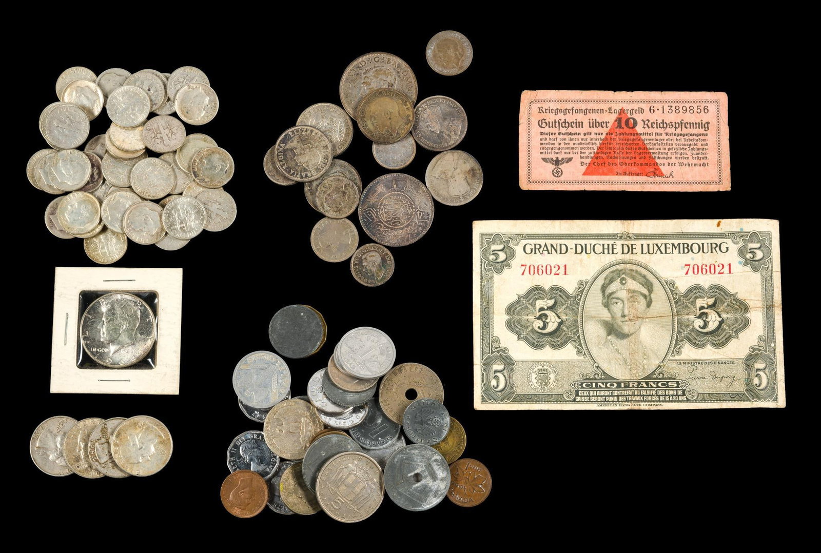 Mixed US And World Coins Including Silver: Silver includes forty four dimes, five quarters, one 1964 Kennedy half, and fifteen silver Canadian, British and Saudi Arabia Riyal.