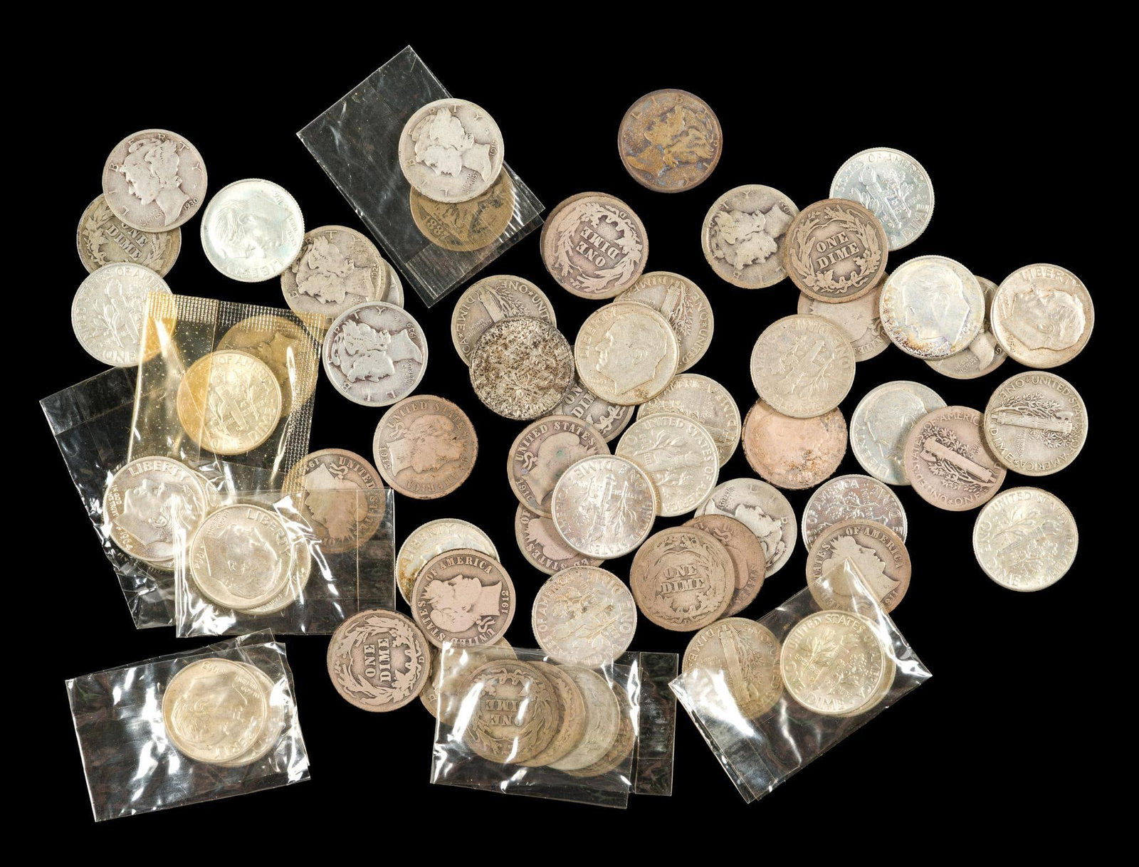 Sixty Silver Dimes Including Barber Mercury Roosevelt: Most of the dimes are Barber And Mercury with the Roosevelt dime typically uncirculated.