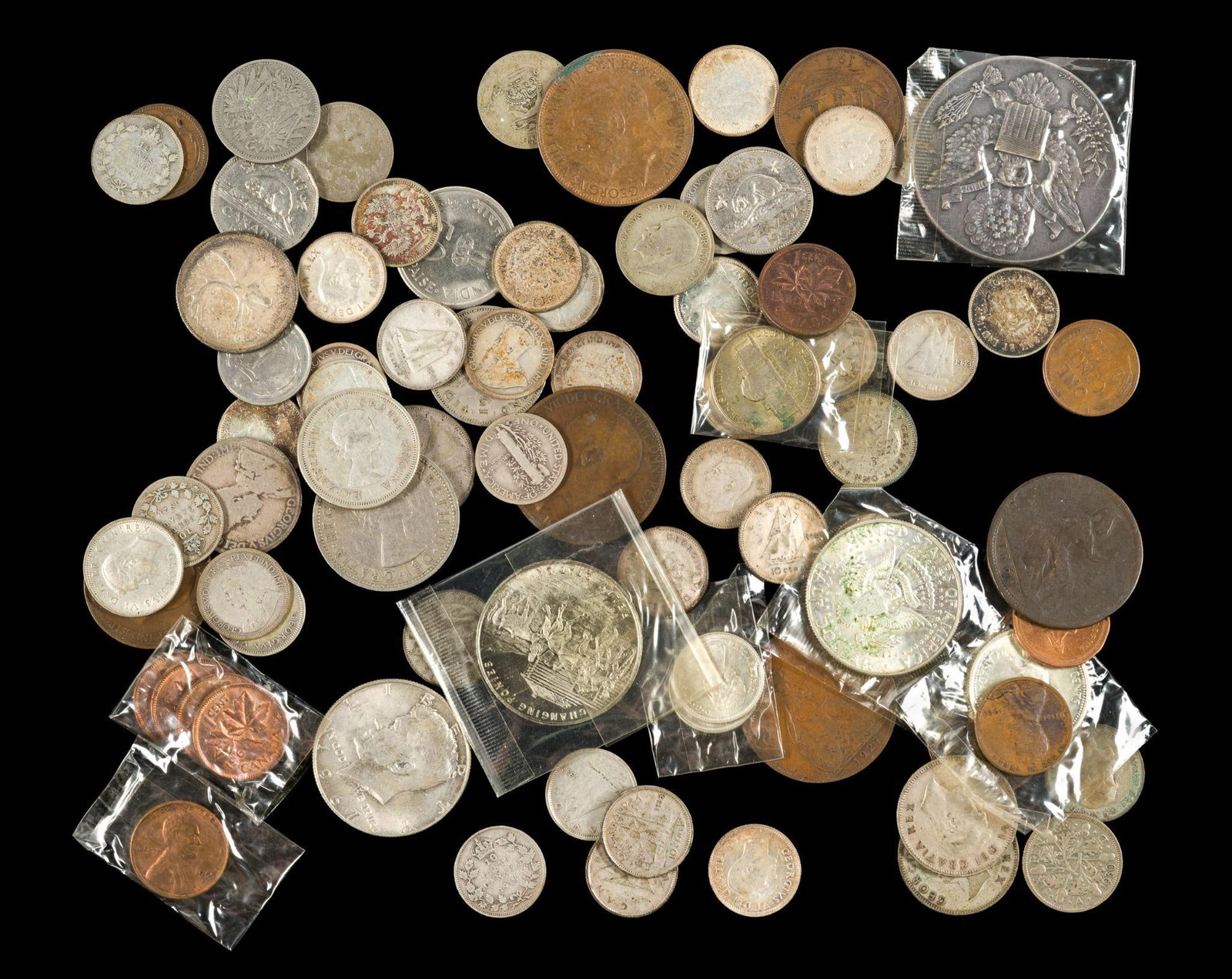 World Coins Including Silver: Most are Canadian silver coins with numerous dimes pre 1920. Also a U.S. half cent 1828, signs of past cleaning, and two 40% silver Kennedy halves.