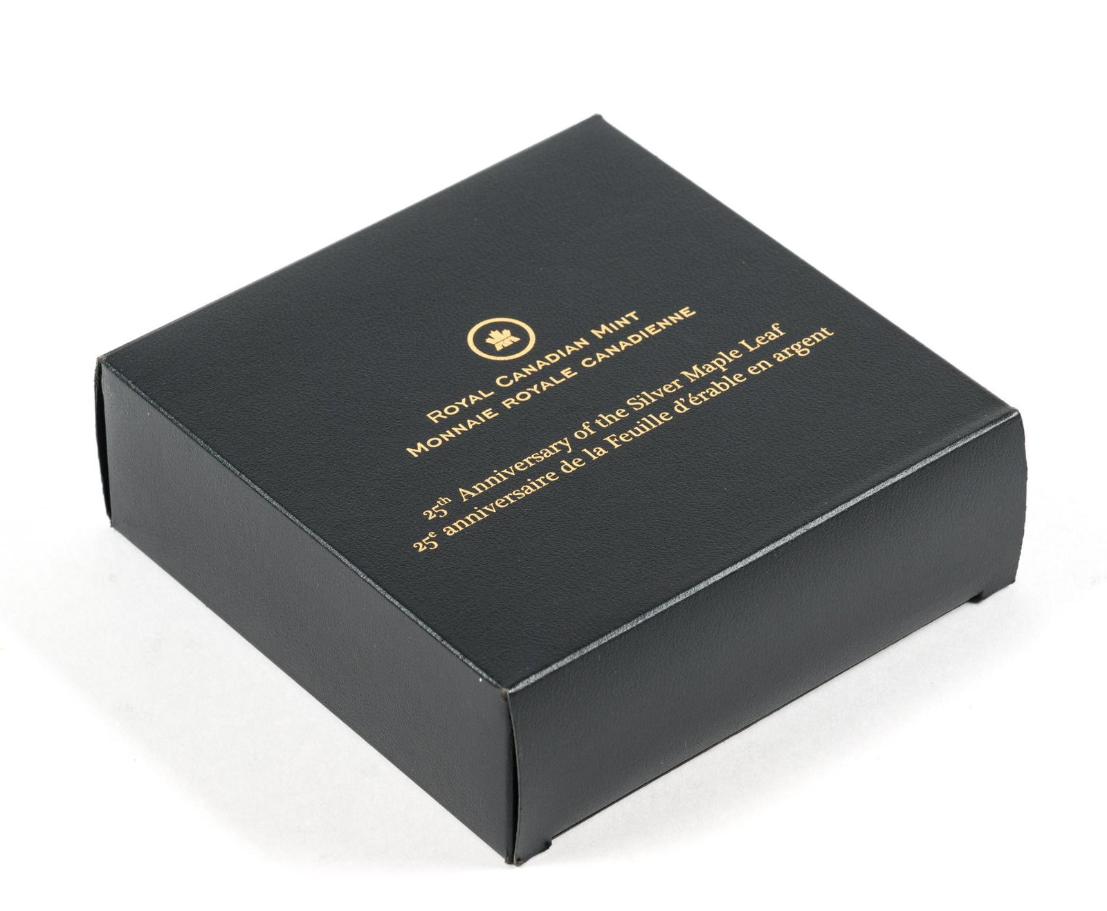 Five Troy Ounce Pure Silver 2013 Canada Coin: Royal Canadian Mint 25th Anniversary Of The Silver Maple Leaf. The denomination is $50.