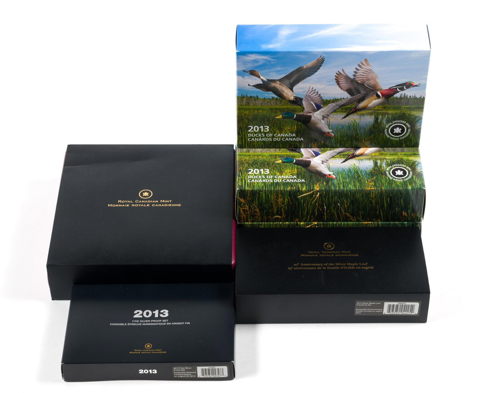 Six Sets Of Pure Silver Coins 2013 Canada: Royal Canadian Mint Ducks OF Canada, 25th Anniversary Of The Silver Maple Leaf, Fine Silver Proof Set, and Canadian Icons set. Seven troy ounces pure silver in total.