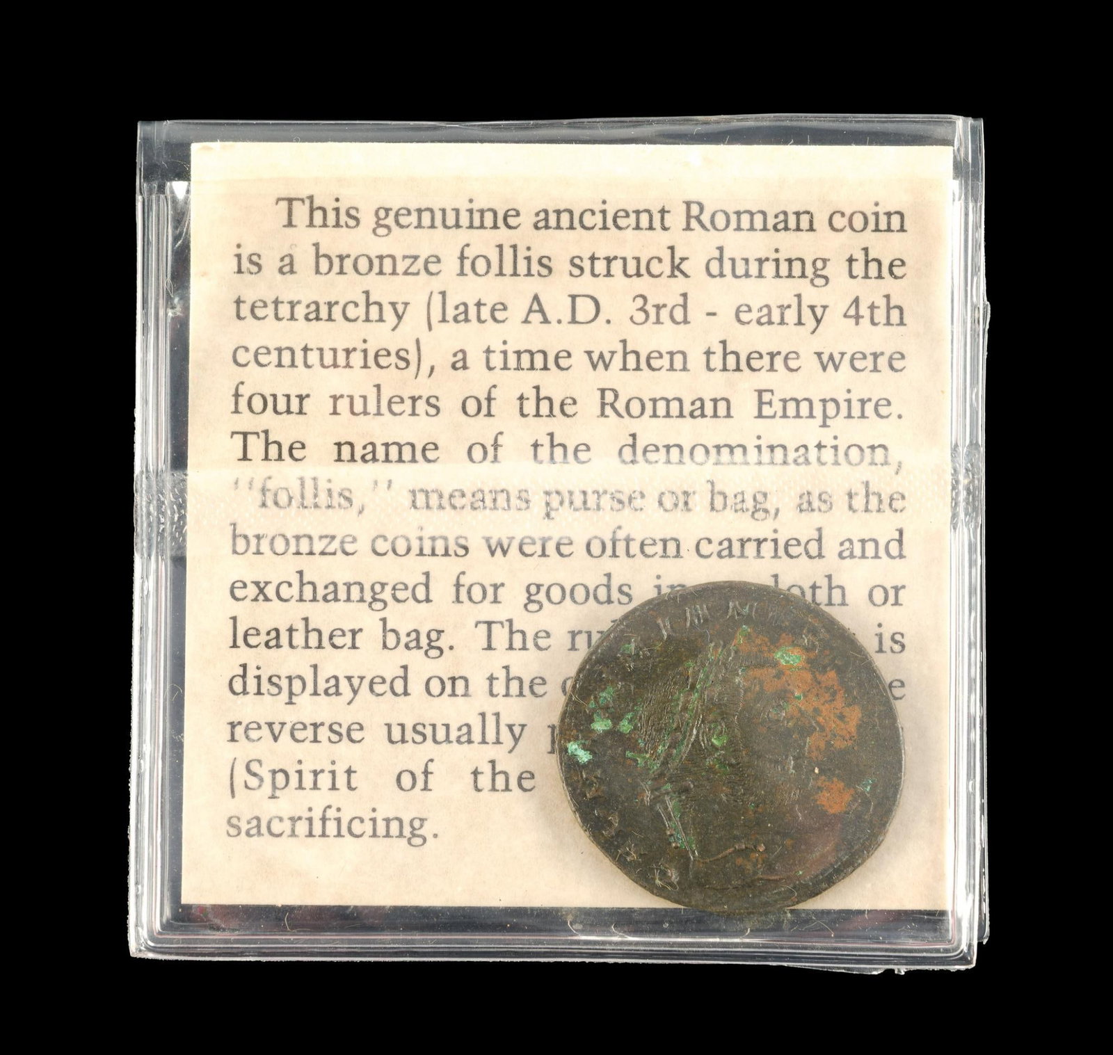 Bronze Follis Ancient Roman Coin: The coin is sealed within a vinyl holder that has a description of the coins origin.