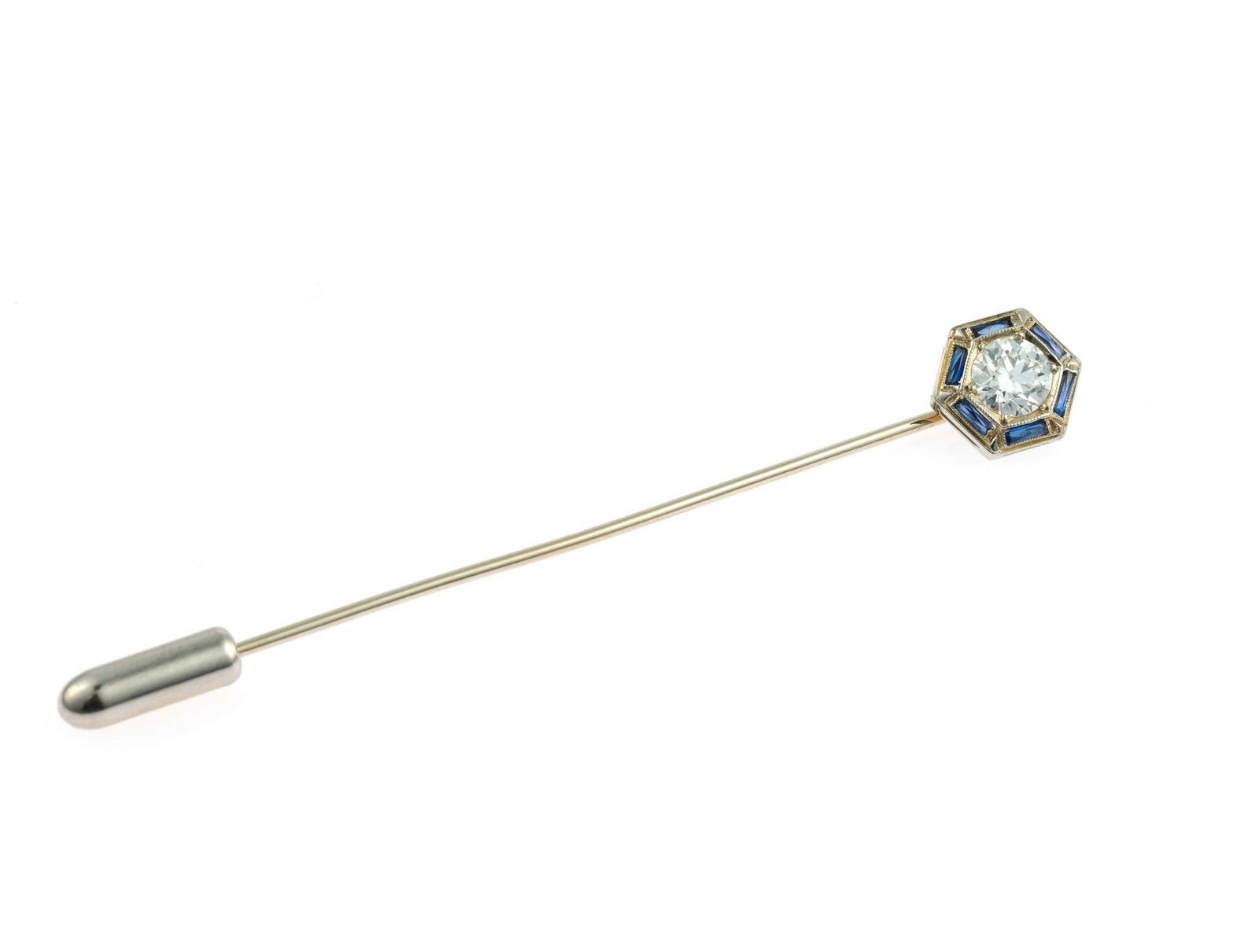 Art Deco 18K Gold, Diamond, and Sapphire Stick Pin: A white gold antique stick pin with a fine European cut diamond surrounded by sapphires. The diamond is approximately 0.70 carat, Clarity VVS1, Color G-H. The pin is unmarked and tests low 18k. It