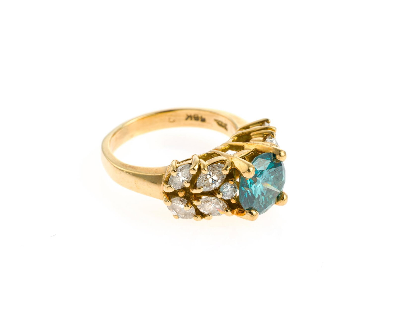 18K Gold and 1.6 Ct Blue Diamond Ring: A size 5 ring with a central round brilliant cut greenish blue treated diamond flanked by marquise and round cut accent diamonds. The central diamond is approximately 1.6 carats (by formula, 7.66mm x
