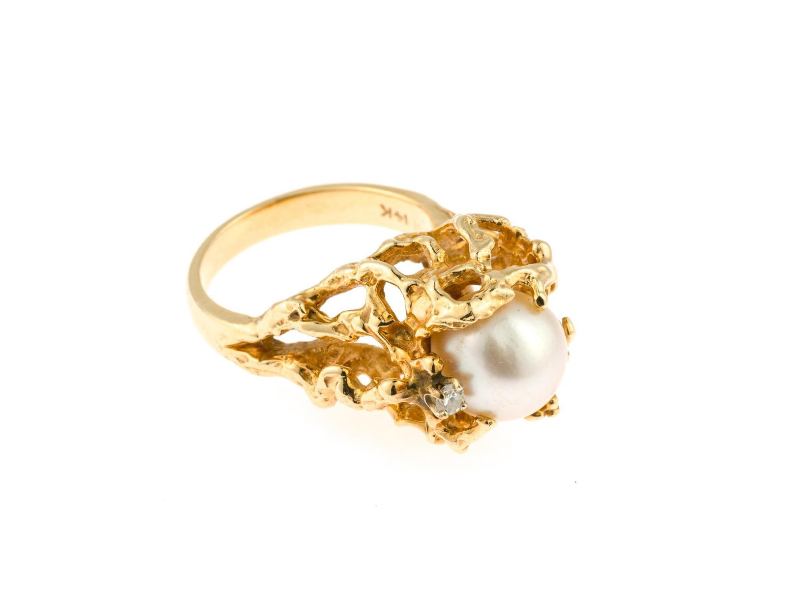 Brutalist 14K Gold, Pearl, and Diamond Ring: A modern organically designed ring in yellow gold, size 6, with center 9mm pearl and diamond accent. The ring is marked 14k and weighs 9.5 grams.The pearl and diamond weigh approximately 0.7 grams.