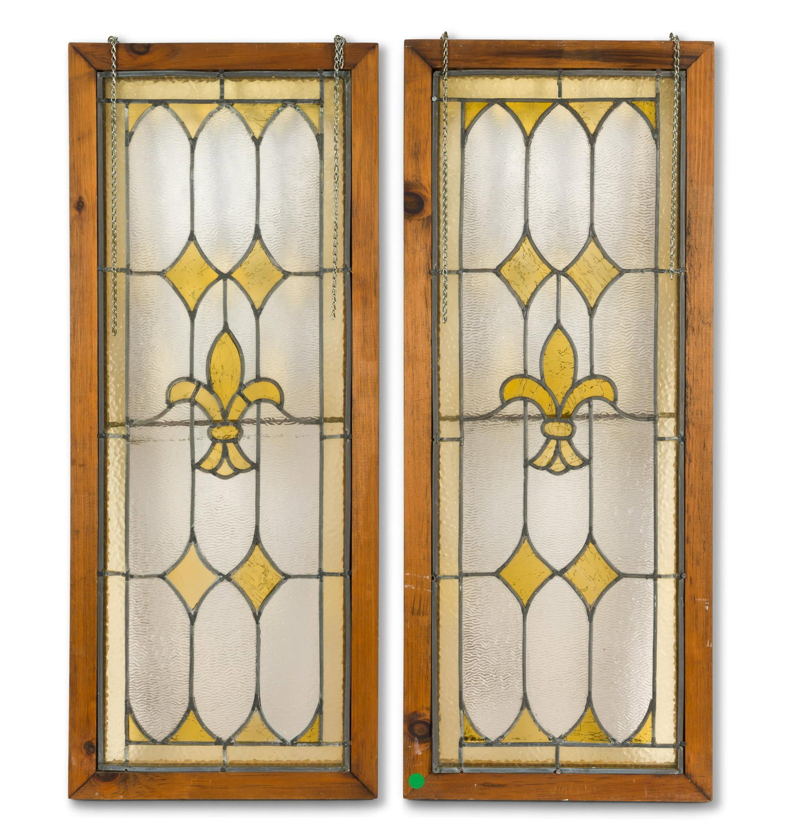 Pair of Stained Glass Windows: With fleur de lis design in center. 36-1/8" high x 14-3/4" high. 