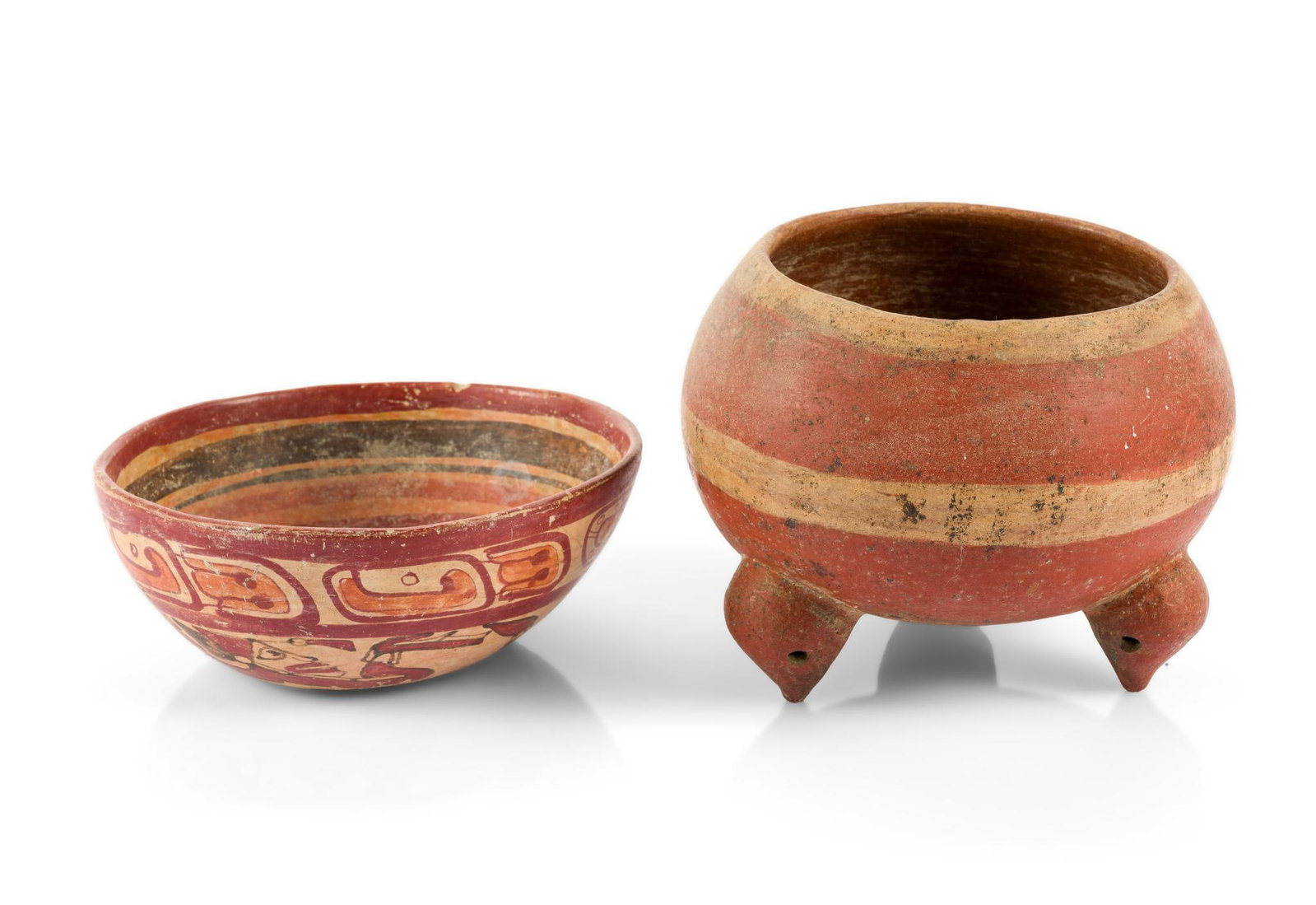 Pre-Columbian Bowls Including Copador and Chupicuara: One tripod Chupicuaro bowl, 500 BCE Mexico and one Copador style swimmer bowl, Maya, 600 - 900 CE. The sizes are 6" to 6-1/4" wide x 2-1/2" to 5" high. One bowl with chips to the rim. One