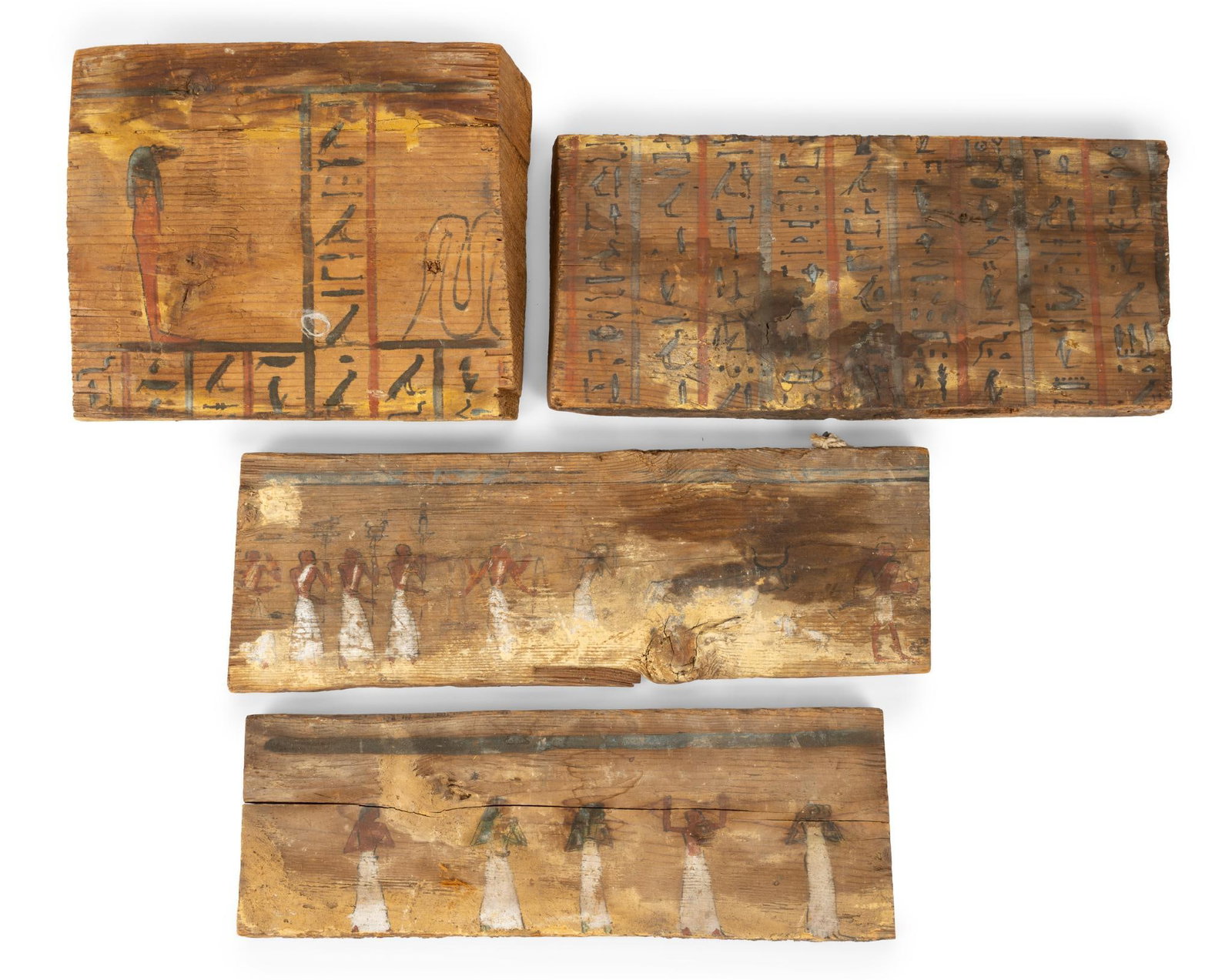 4 Egyptian Painted Wood Fragments: Includes figures, hieroglyphs, and livestock. Some fading to paint, and staining to wood. 10-3/4" to 16-1/2" wide x 5-1/4" to 8-3/8" long. 