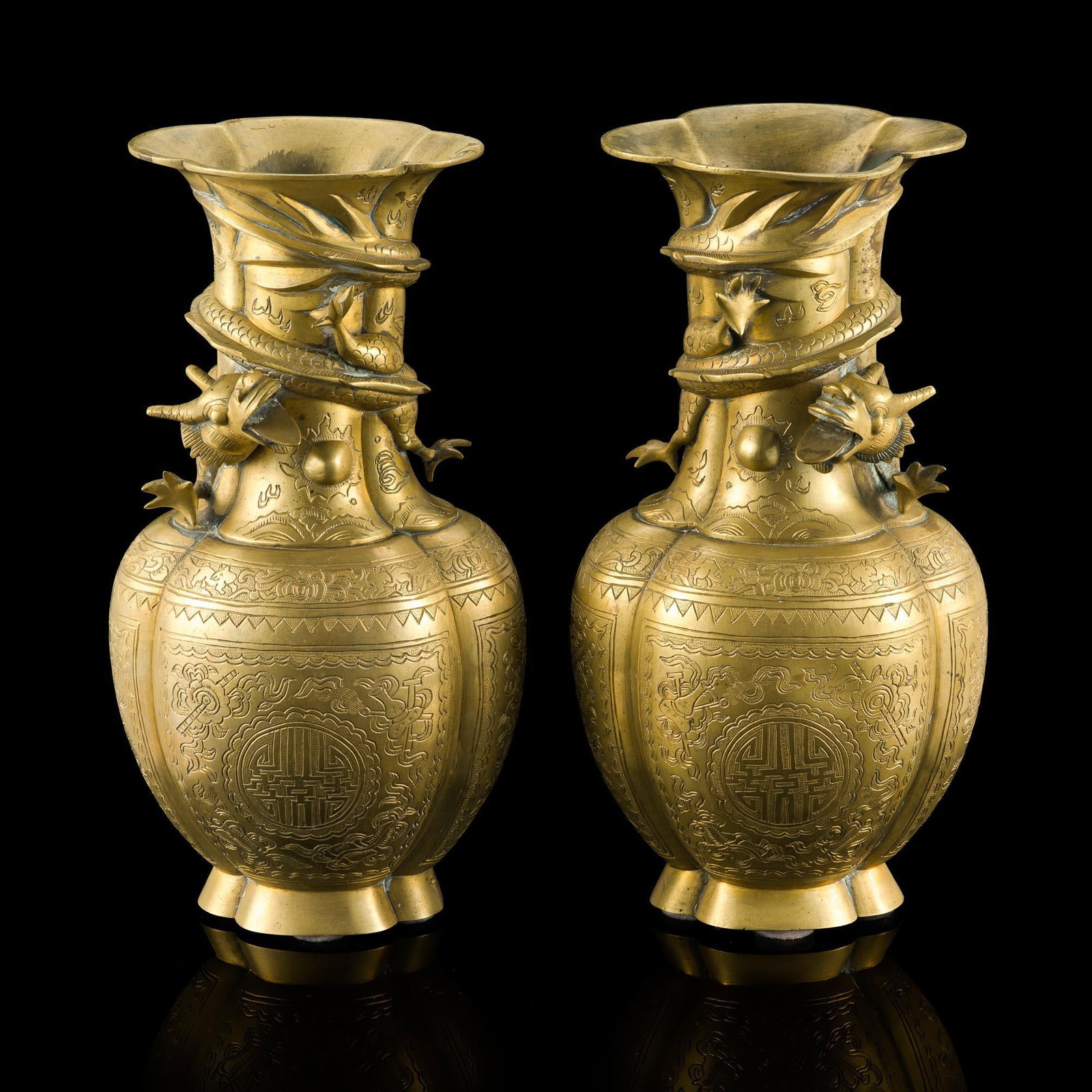 Pair of Chinese Export Brass Dragon Vases: Both marked on bottom. Minor oxidization on surfaces. One has a crack in the metal at the top. Measures 4-1/2" x 5-1/2" x 10". 
