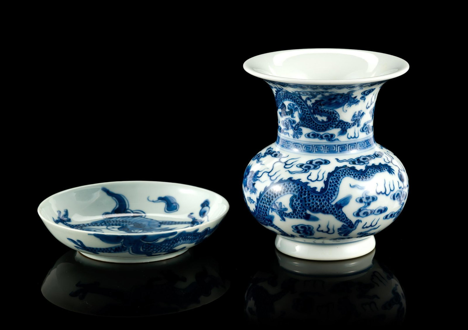 Chinese Imperial Blue and White Vase with Saucer: Mark and period of Daoguang (1821-1850). Vase 4 1/2" height Saucer 4 5/8" diameter with small chips to rim. 