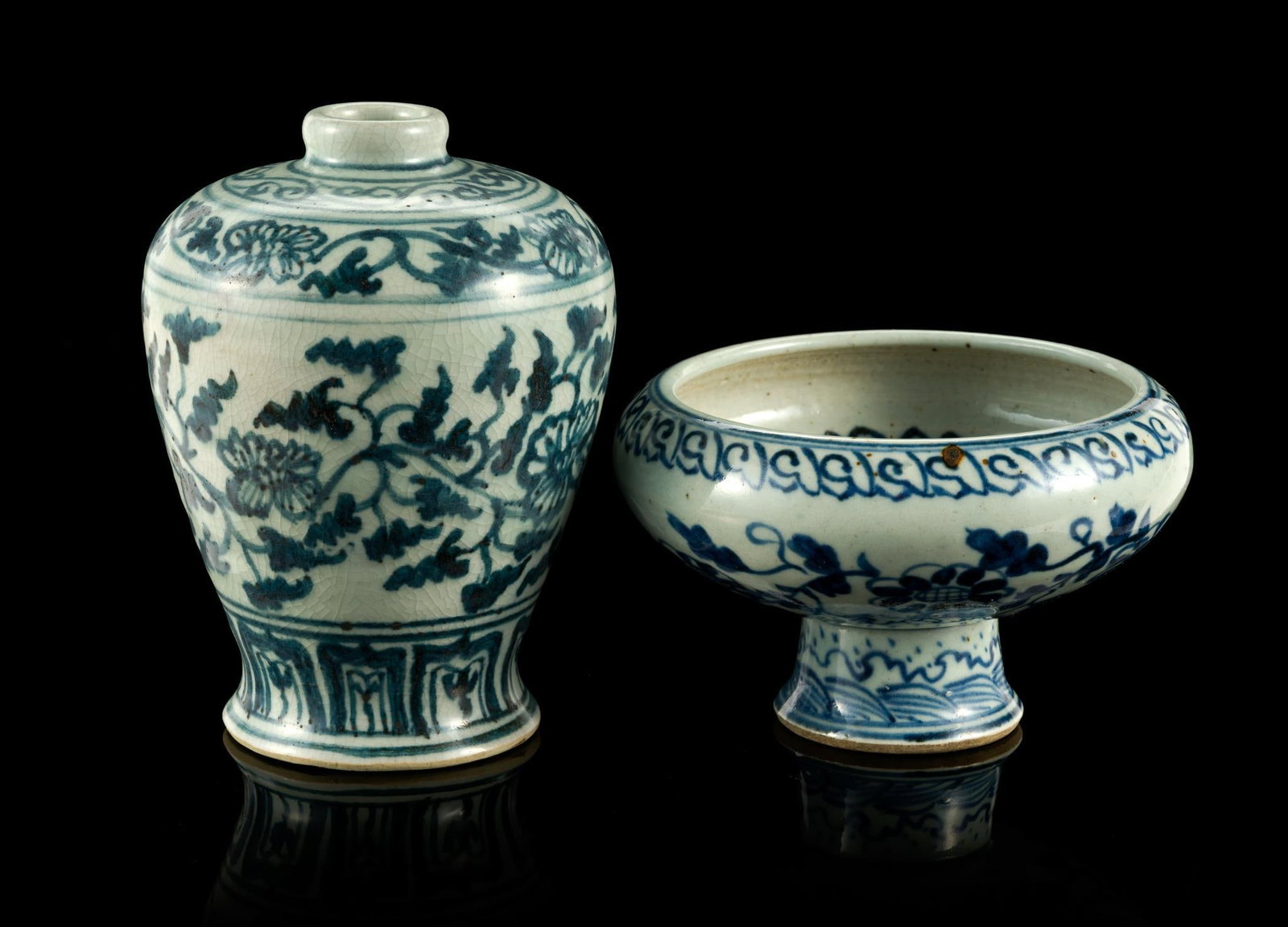 2 Chinese Blue and White Crackle-Glazed Vessels: The stem cup is 5 1/8" diameter and the vase is 5 3/4" tall. Neither piece has markings to the bottom.