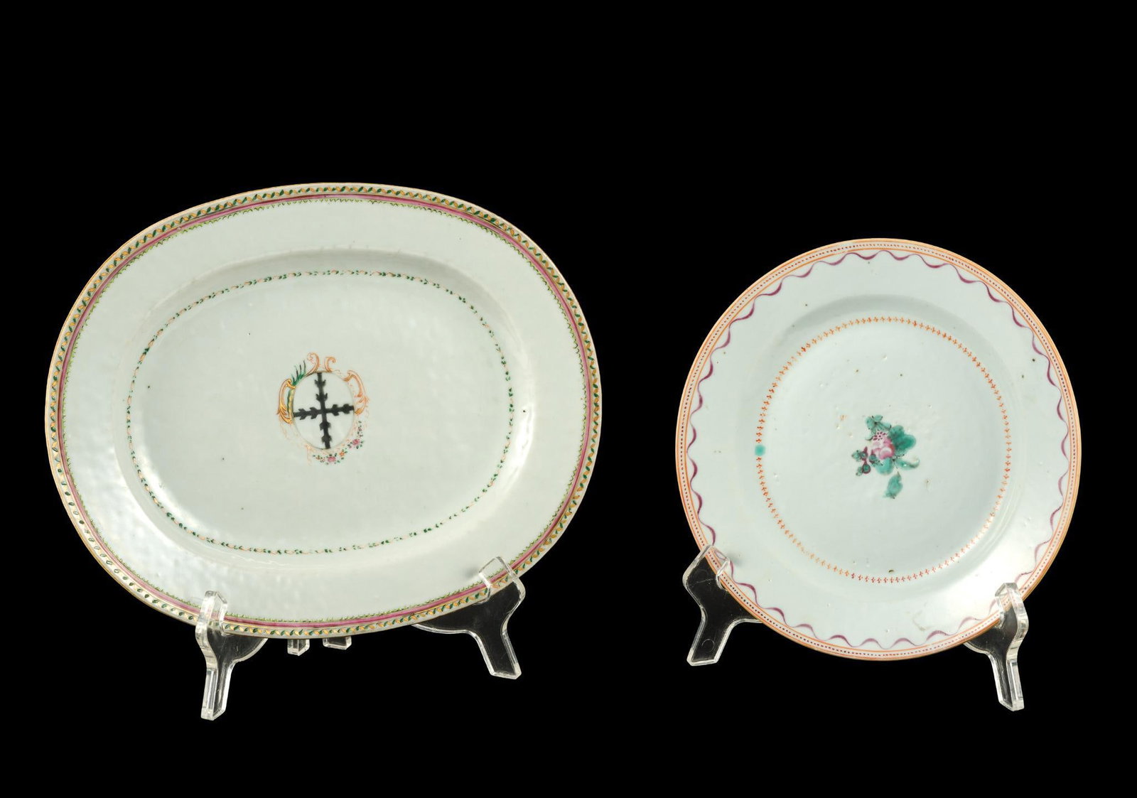 2 Chinese Export Porcelain Plates: Armorial platter decorated with family crest and plate decorated with famille rose pattern. 7-5/8" to 10-3/8" wide x 7/8" to 1" high. 