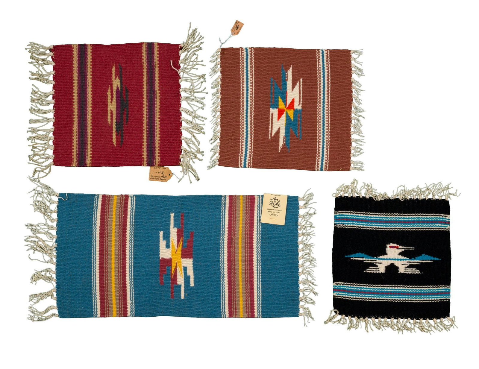 4 Small Chimayo Weavings Incl. Ortega's: Includes two small weavings with diamond motifs on them, a small weaving with a thunderbird motif, and a tagged Ortega's weaving with a diamond motif on it. Both the brown weaving with the diamond