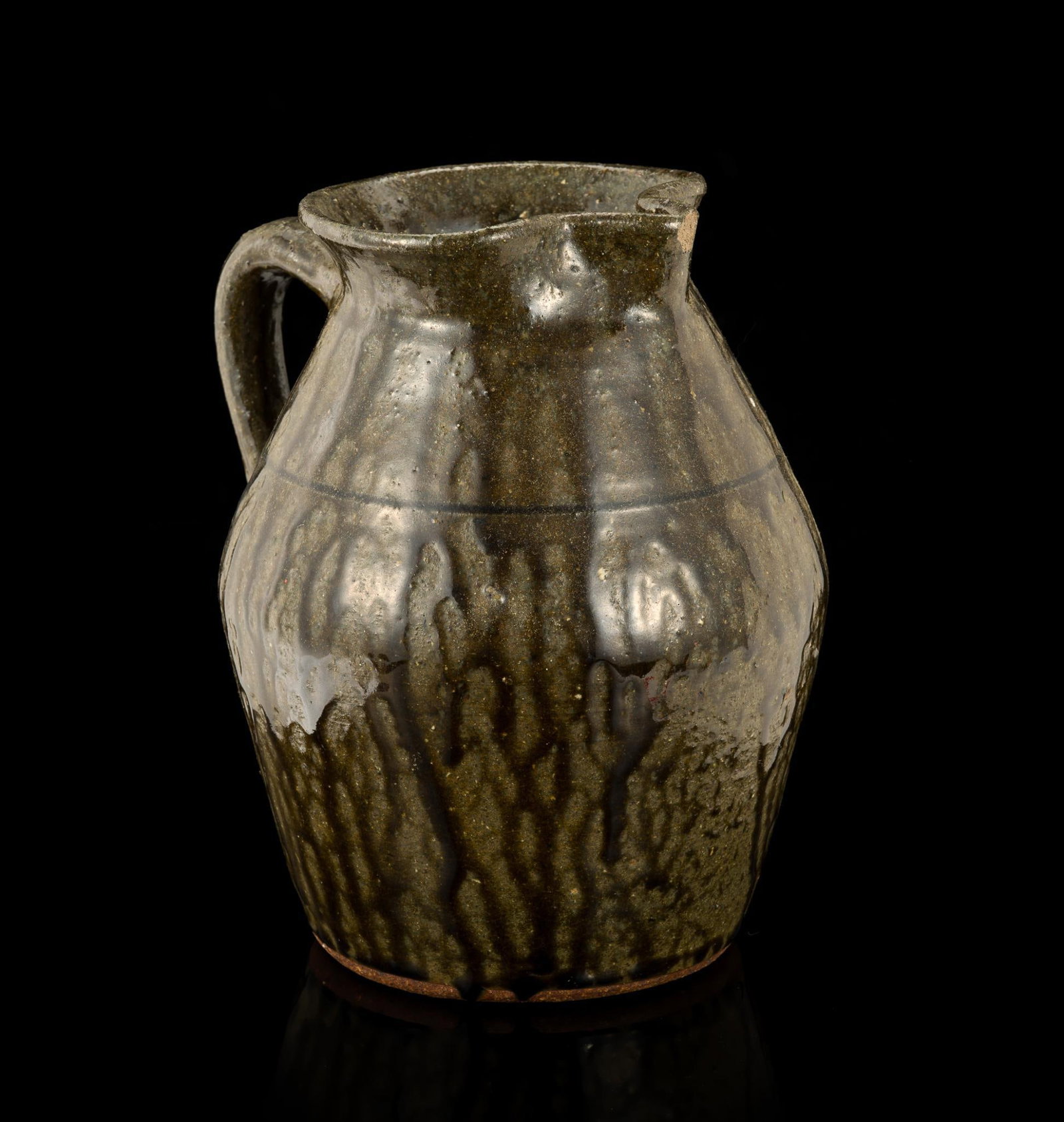 Lanier Meader Pottery Pitcher: Signed. Meader is a national folklife master potter and progenitor of the southern pottery revival. 5-3/4" wide x 7-1/2" high. 