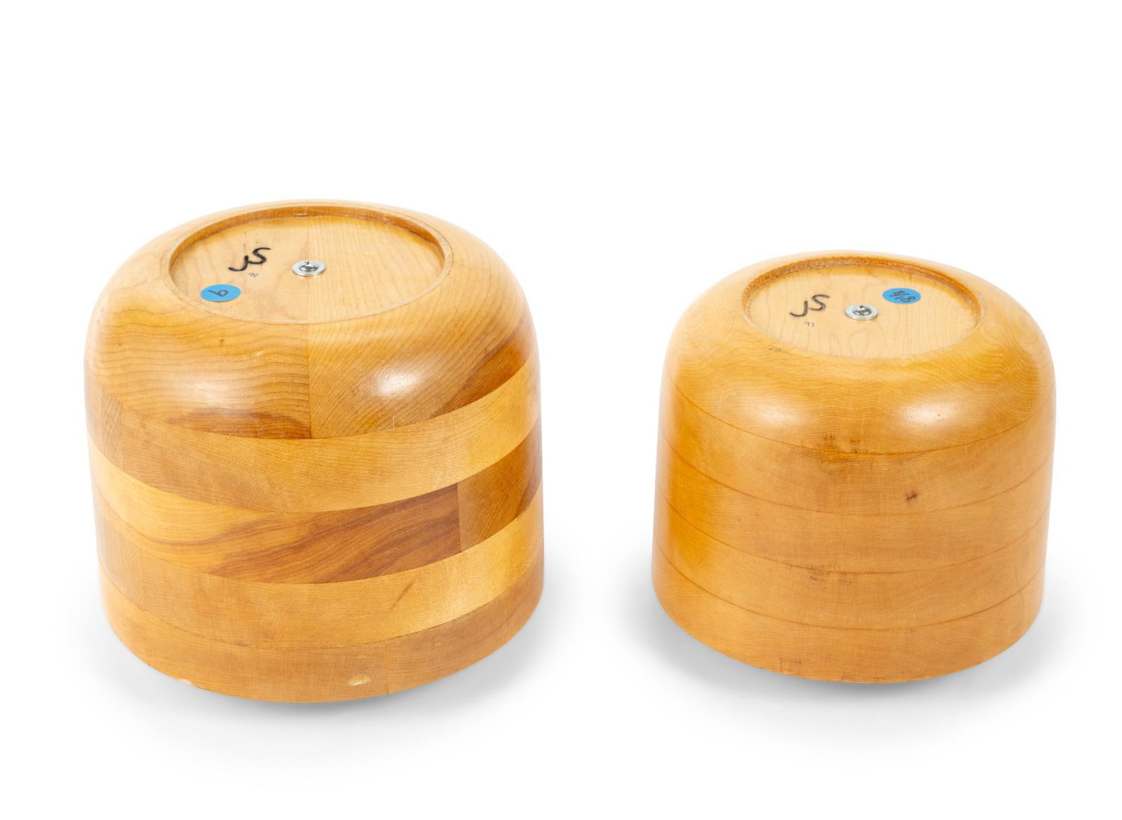 2 Large Round Nantucket Basket Molds: 2 large Nantucket round basket molds of varying size, both in good condition with some wear and tear. Both have previous owner stamp on bottom "JS". Smallest measures 10" x 9"; largest measures 11" x