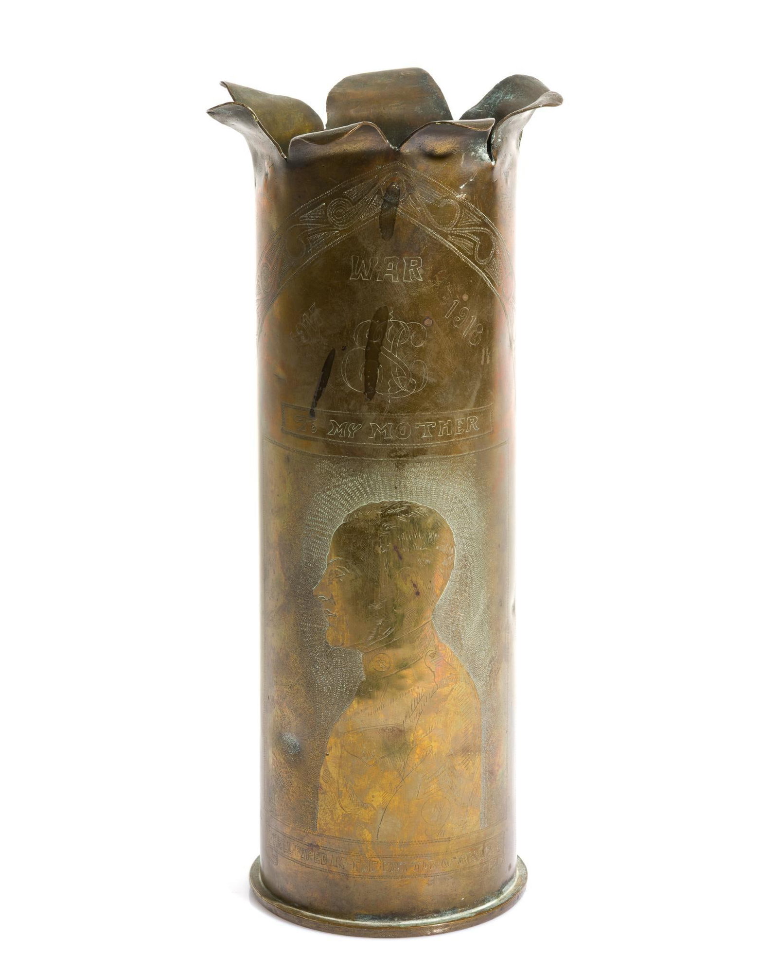 WWI Trench Art Shell Vase: Presented by an unidentified soldier in the 43rd Coast Artillery Regiment to his mother. Shell case features an engraved profile from the waist up of a soldier who is wearing a collar disc with a "43"