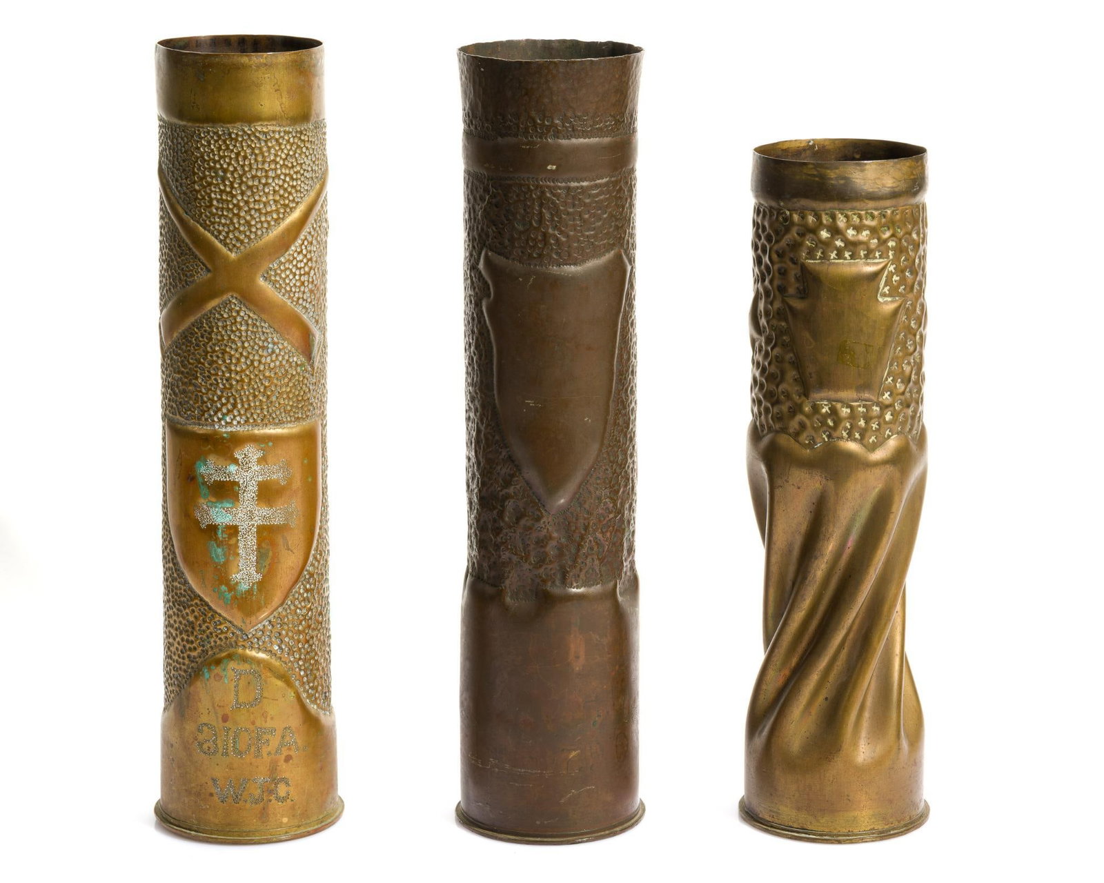 3 WWI Trench Art Shells: Includes (1) Trench art shell made from French brass 75mm shell casing dated 1918. Lower half is fluted and twisted. Upper half is stippled and features an embossed keystone, the insignia of the 28th