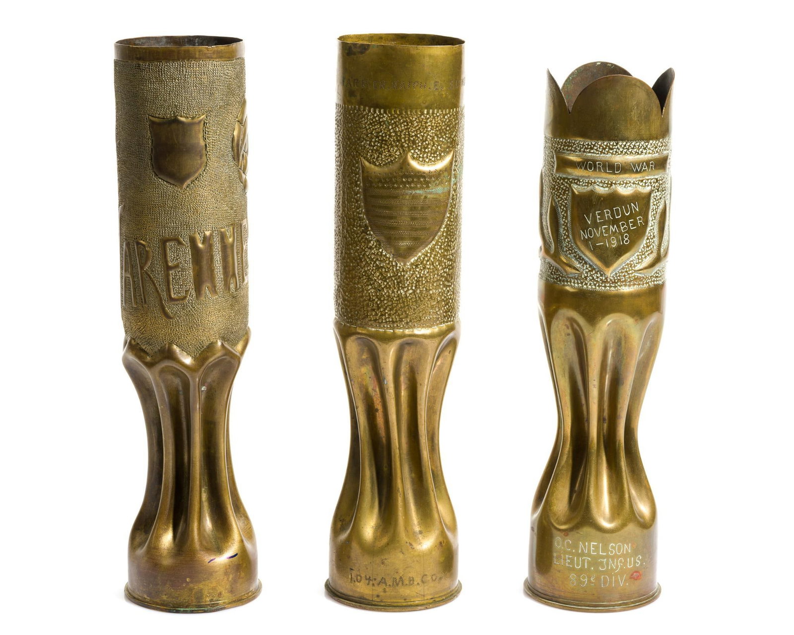 3 WWI Trench Art Shells: Includes (1) Trench shell vase belonged to Lt. Oscar C. Nelson (1893-1962), 89th Division. In 1917, he enlisted in the 2nd Wisconsin National Guard as a 2nd Lt. and in 1918 he accepted a commission