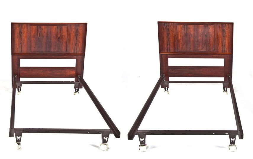 Set of Falster Rosewood Twin Beds: DESCRIPTION: A pair of Falster rosewood twin head boards. Metal frames. Reverse of headboards with woven panels. MEASUREMENTS: Headboards 40" x 37". CONDITION: No defects noted