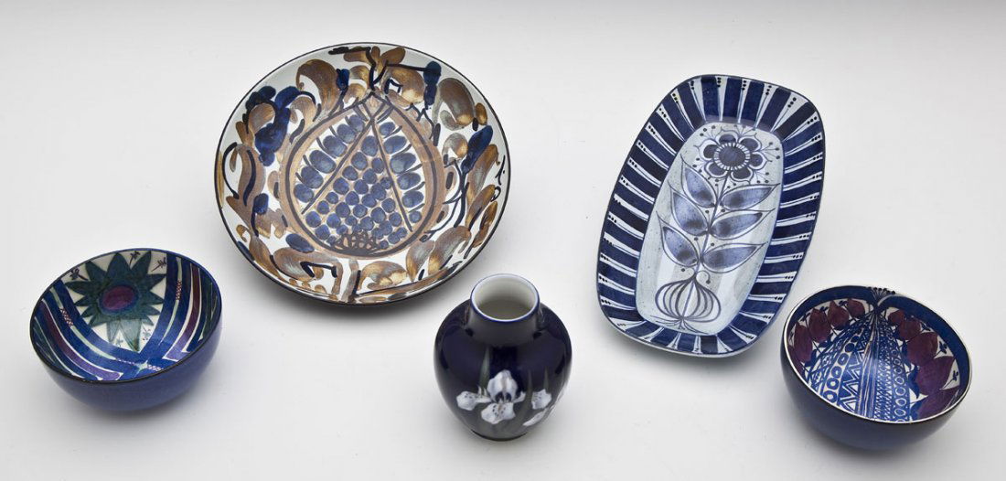 5 Pieces of Royal Copenhagen Pottery: DESCRIPTION: Five pieces of Royal Copenhagen pottery. Includes: 1) 4" x 3" diameter blue vase with flowers 2) Two small 2-1/8" x 4-1/4" diameter blue bowls 3) Large 1-5/8" x 7-3/4" blue bowl 4) 5-3/8"