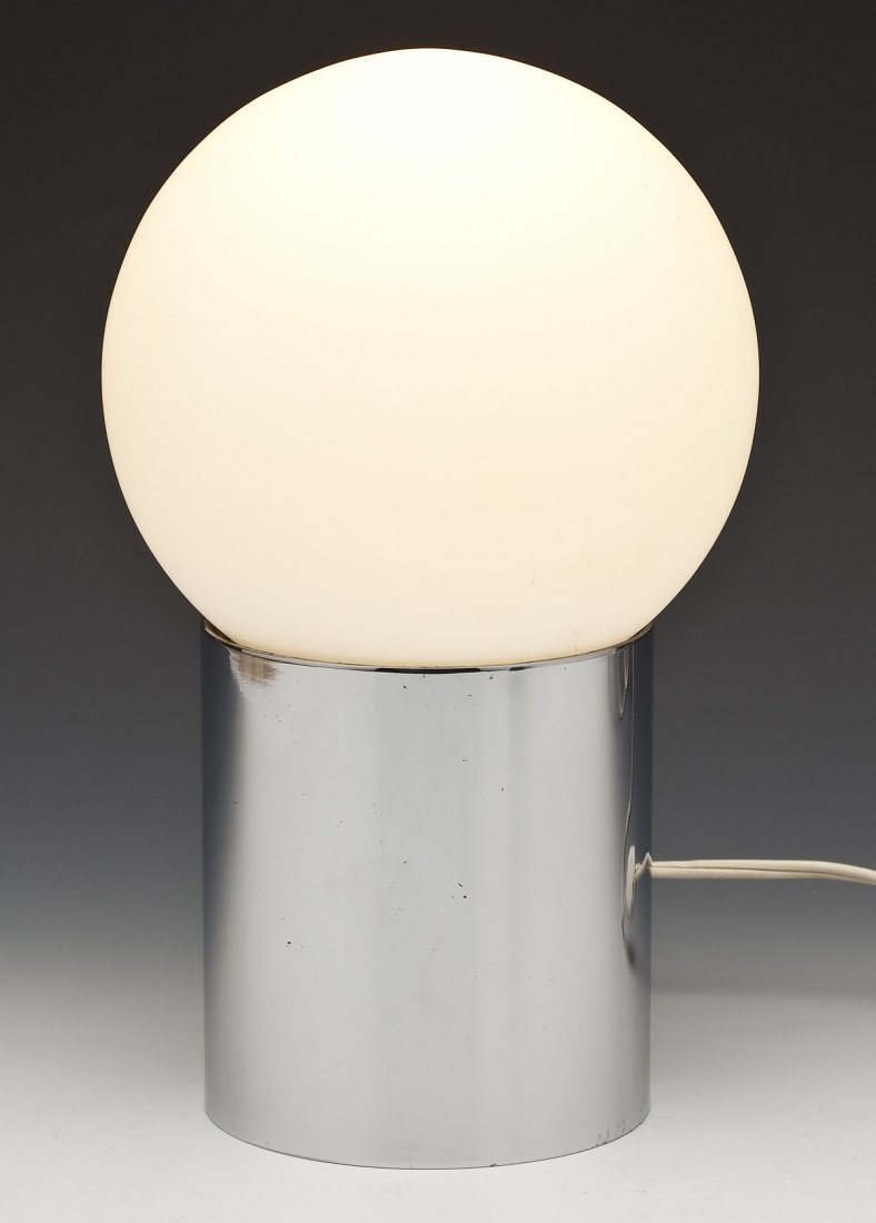 Sonneman Style Chrome & Glass Table Lamp: DESCRIPTION: Mid-century Sonneman style table lamp with cylindrical chrome base and round glass shade. MEASUREMENTS: 11". CONDITION: Small chip and fleabites to rim of shade, not visible when in place