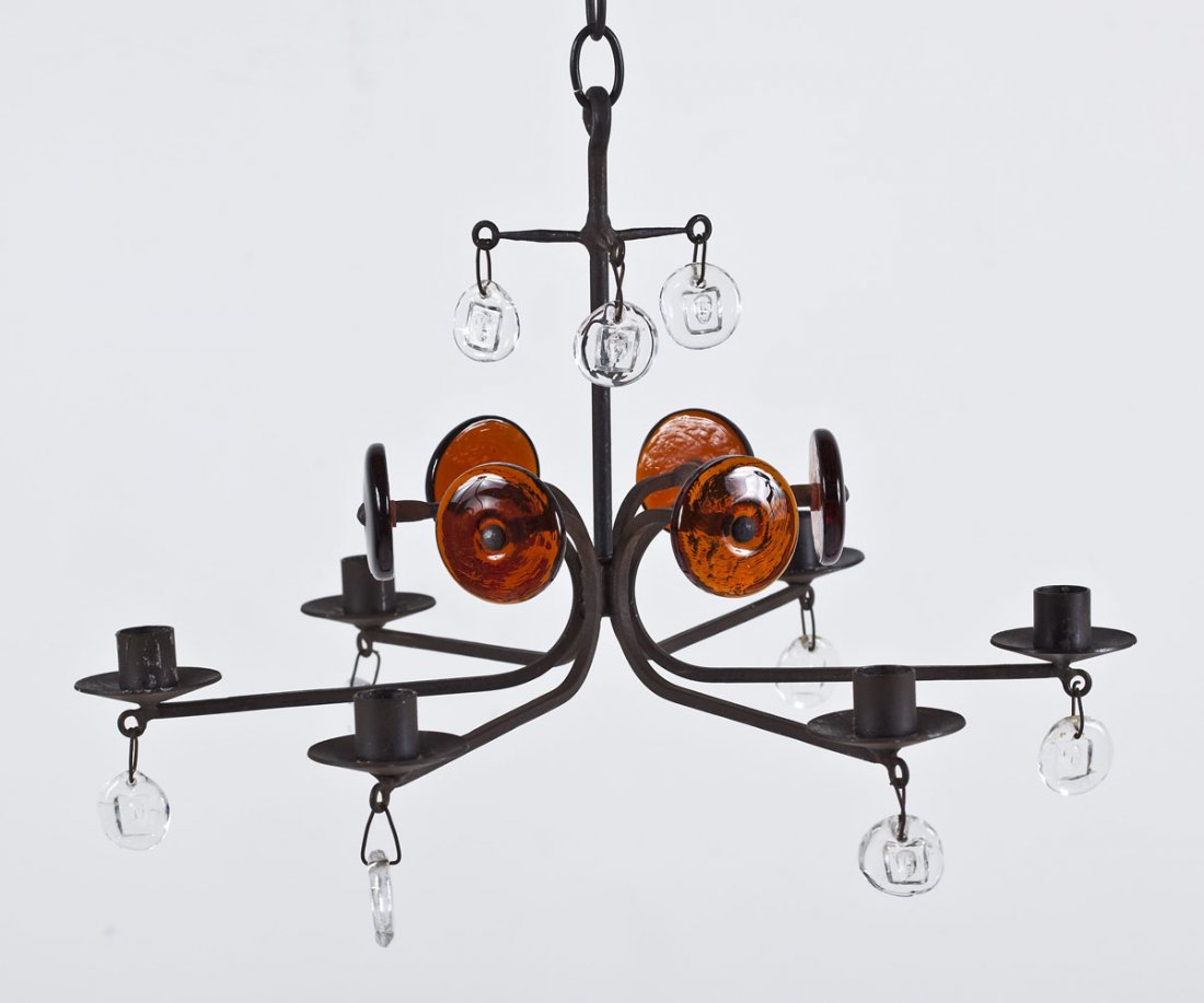 Erik Hoglund Six Light Chandelier: DESCRIPTION: Mid-century Erik Hoglund (Swedish, 1932-1998) six light chandelier. Boda Nova Glassworks/Axel Stromberg Ironworks, Sweden. Iron frame with six orange glass discs and nine clear glass pend