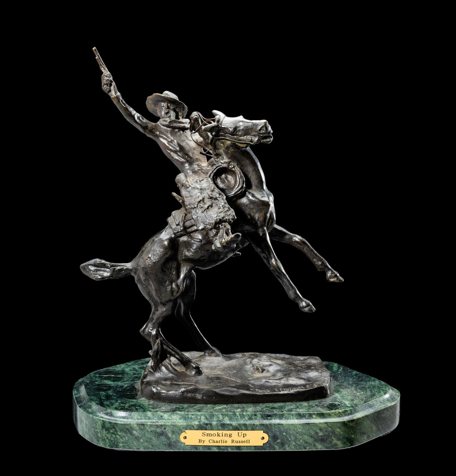 After Charles Marion Russell "Smoking Up" Bronze Sculpture: Measures 11-1/2" x 7" x 13". Bronze on a fine marble base. 