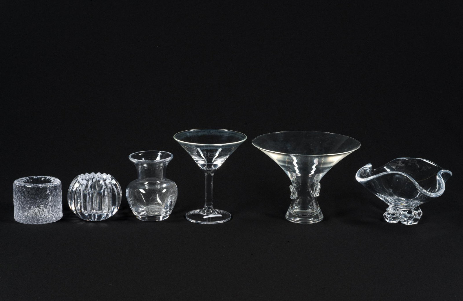 6 Signed Cut Glass Incl. Simon Pearce & Steuben: Largest piece measures 7-1/4" x 7-1/4" x 5-1/4" and the smallest piece measures 3" x 3" x 2-1/2". Includes four pieces of Simon Pearce glass and one piece of Steuben and one French Cristal Baccarat