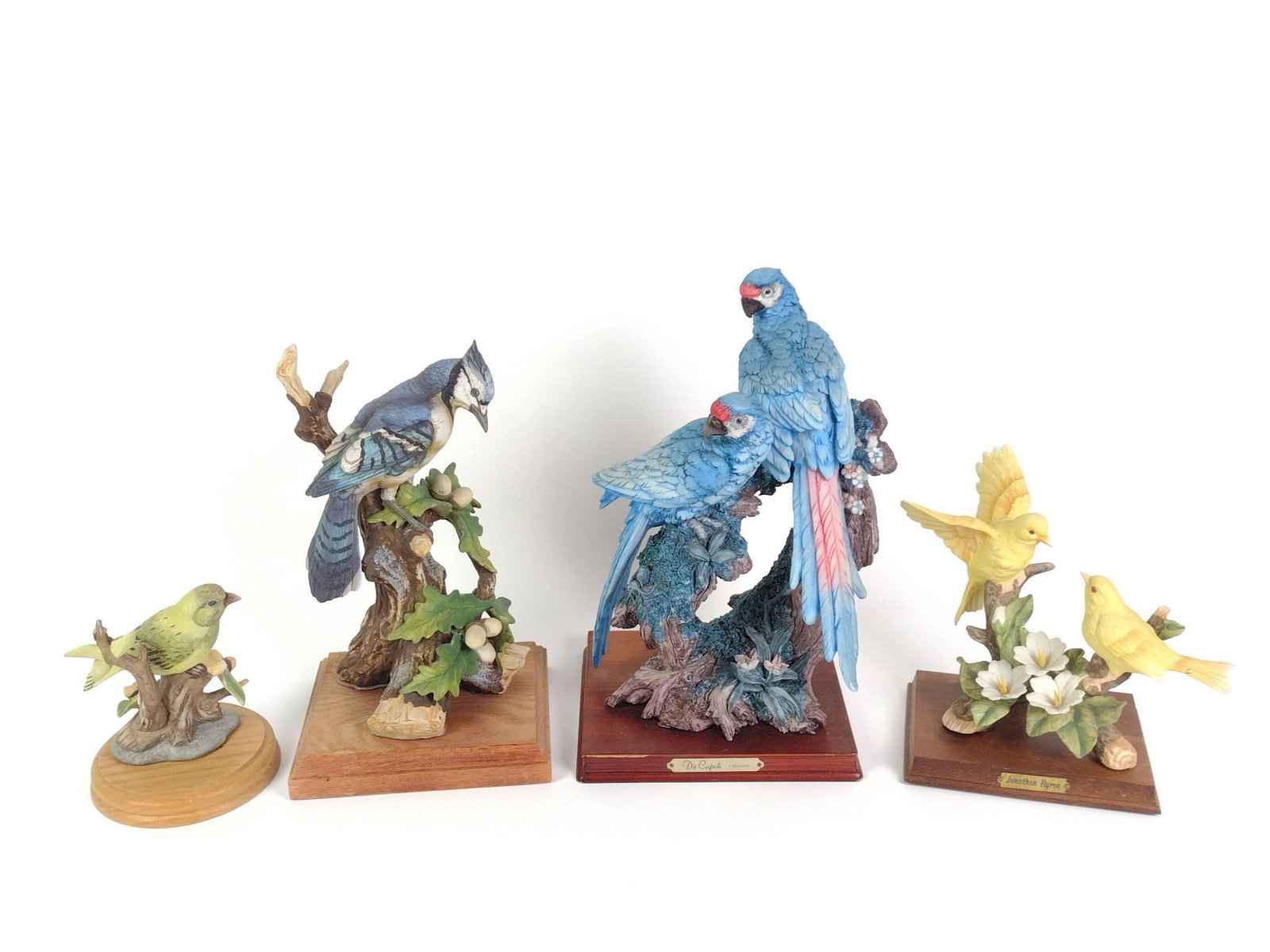 4 Porcelain Bird Statues Incl. De Capoli & Jonathon Byron: Largest piece measures 8" x 6" x 13". 